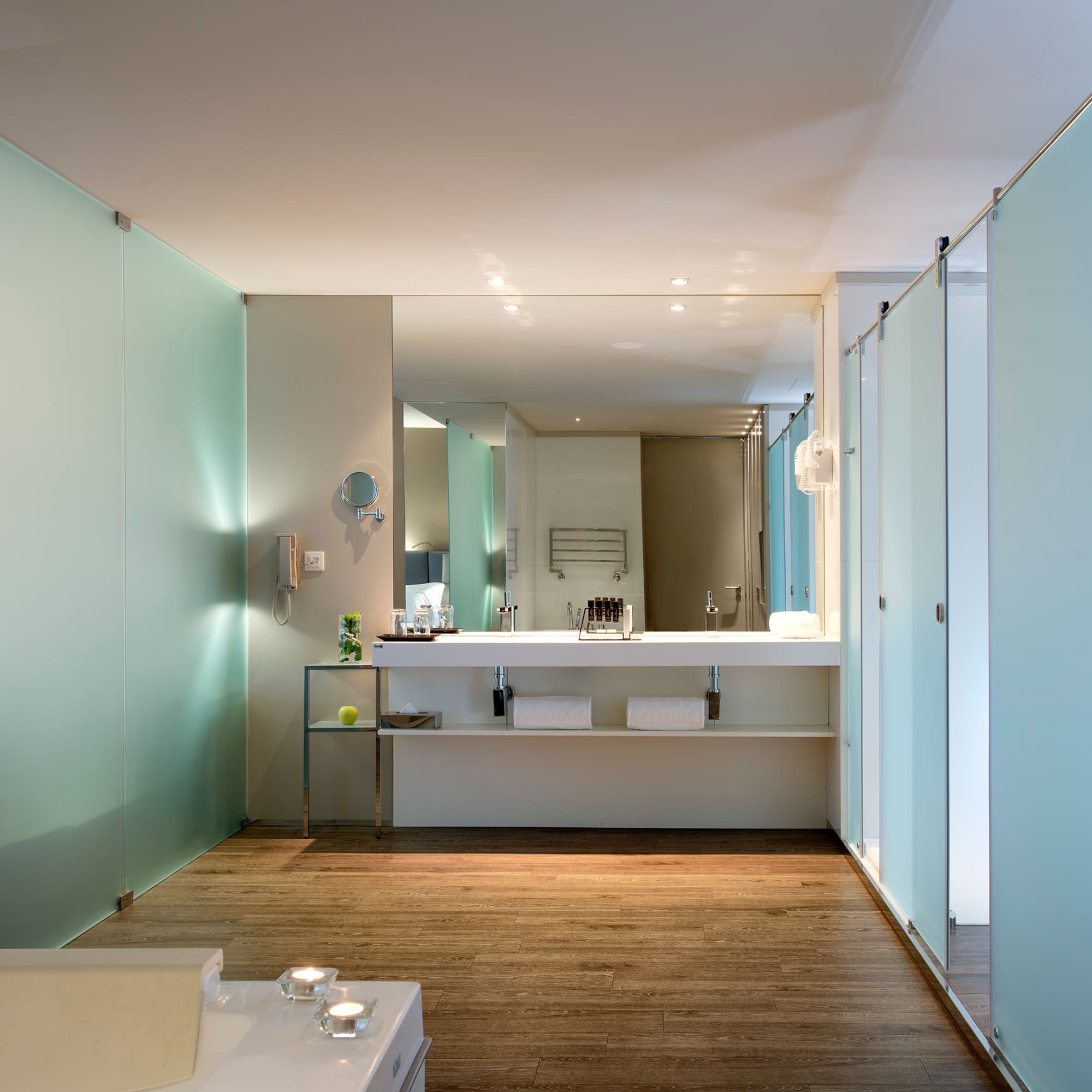 a bathroom with a mirror and sink