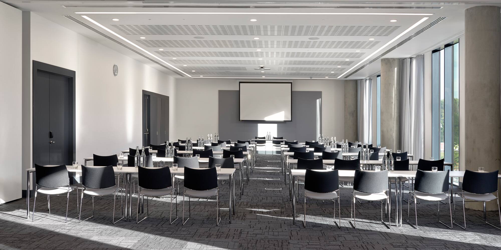 a room with tables and chairs