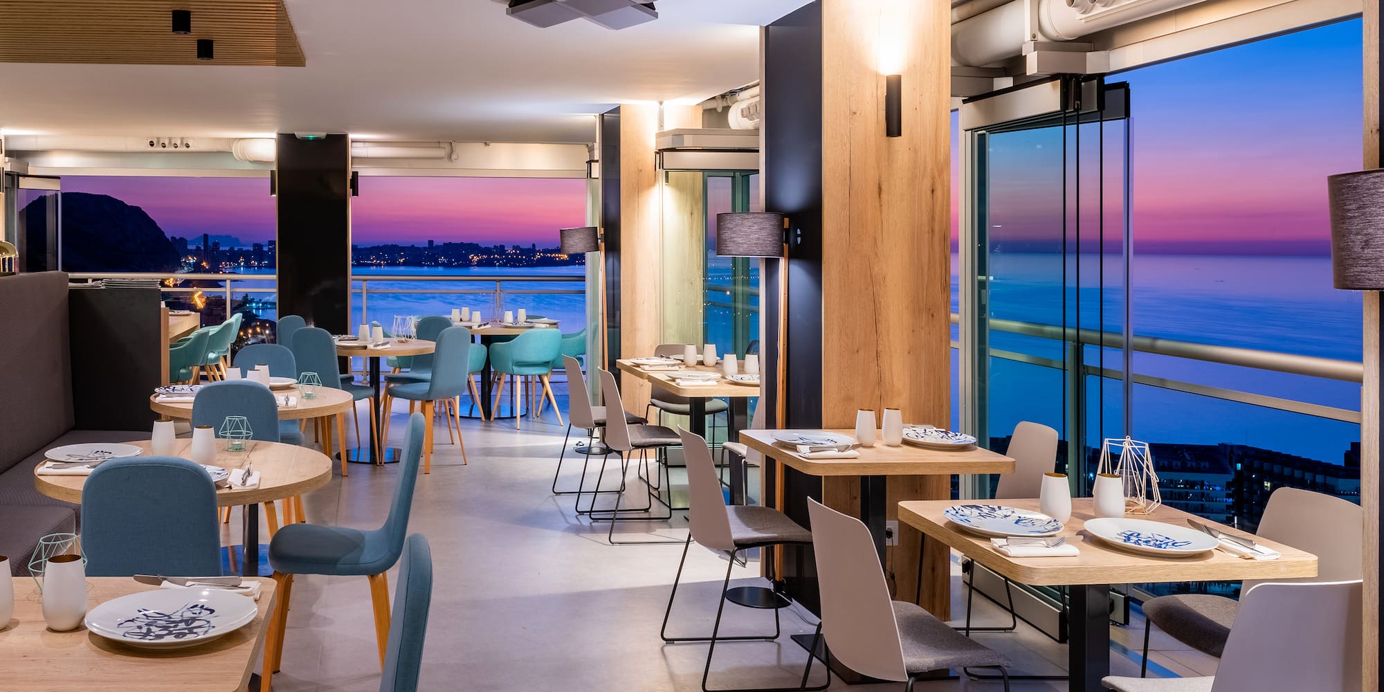 a restaurant with tables and chairs