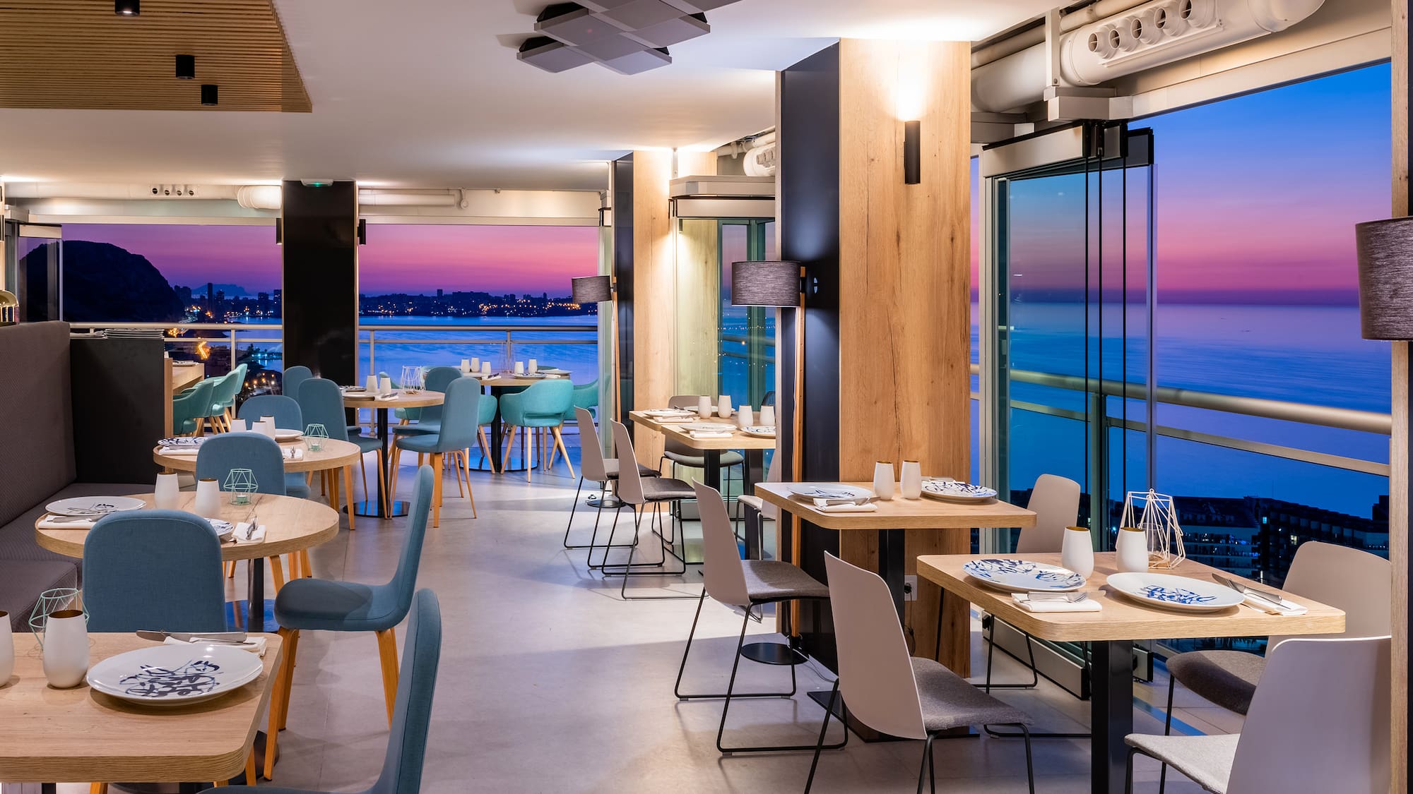 a restaurant with tables and chairs