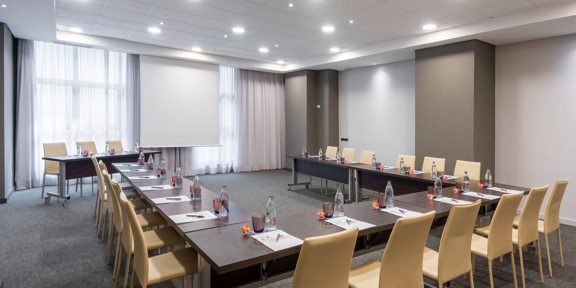 a room with tables and chairs