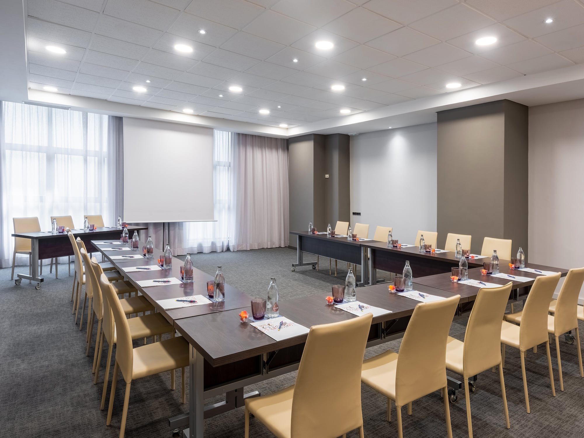 a room with tables and chairs