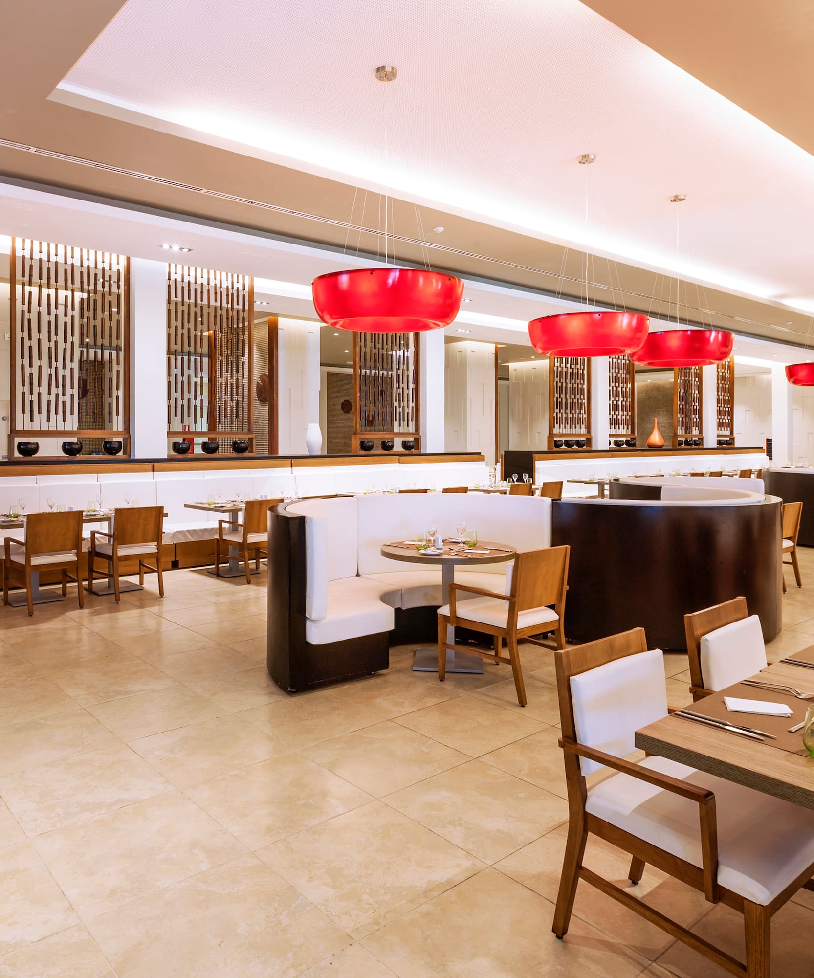 a restaurant with tables and chairs