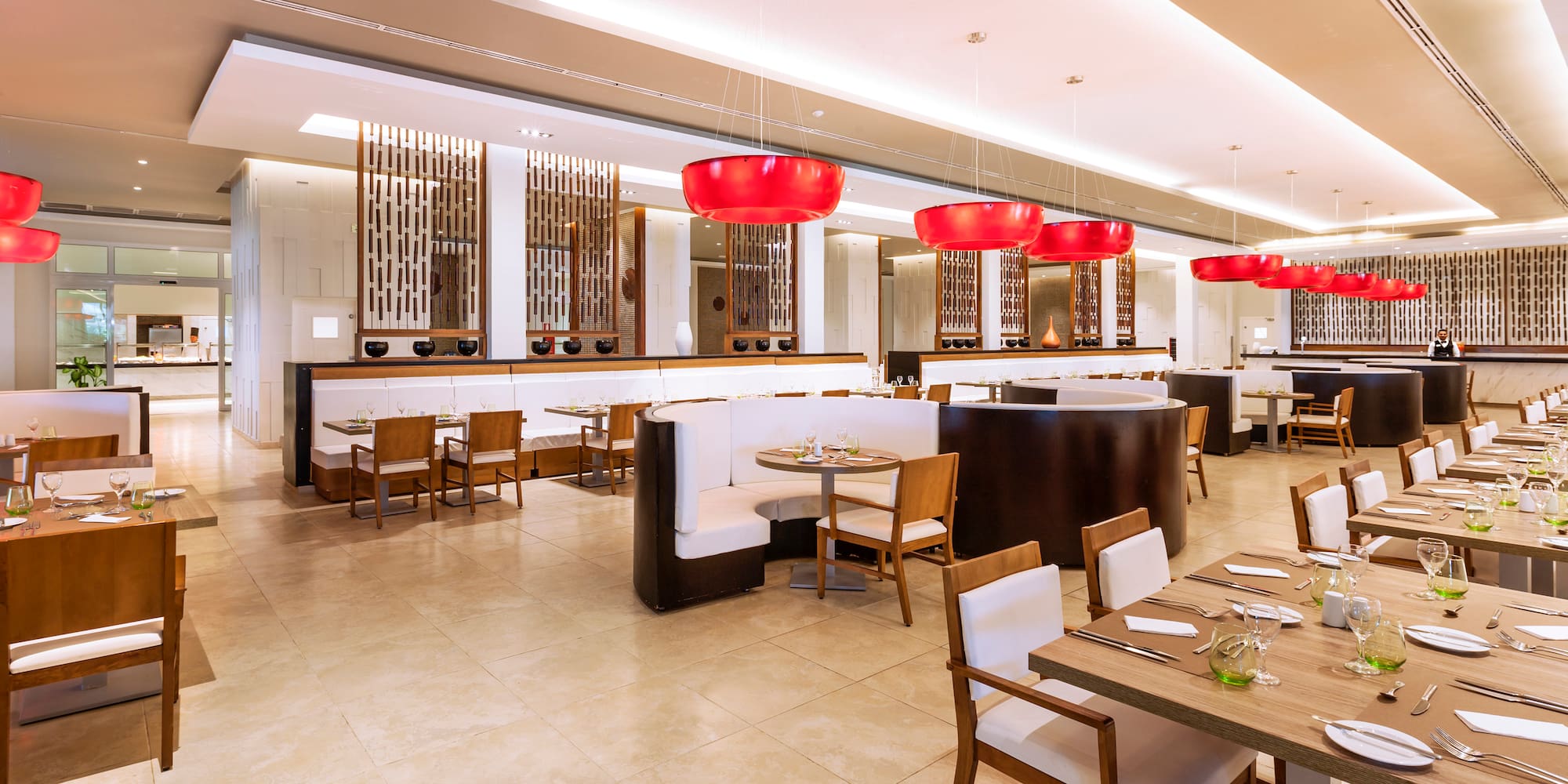 a restaurant with tables and chairs