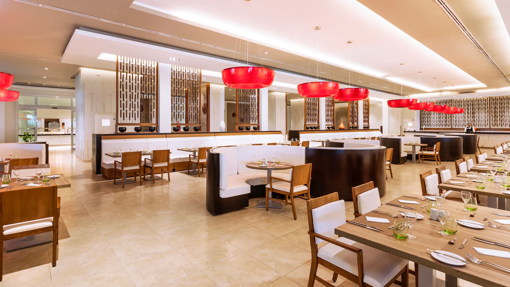 a restaurant with tables and chairs