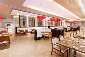 a restaurant with tables and chairs