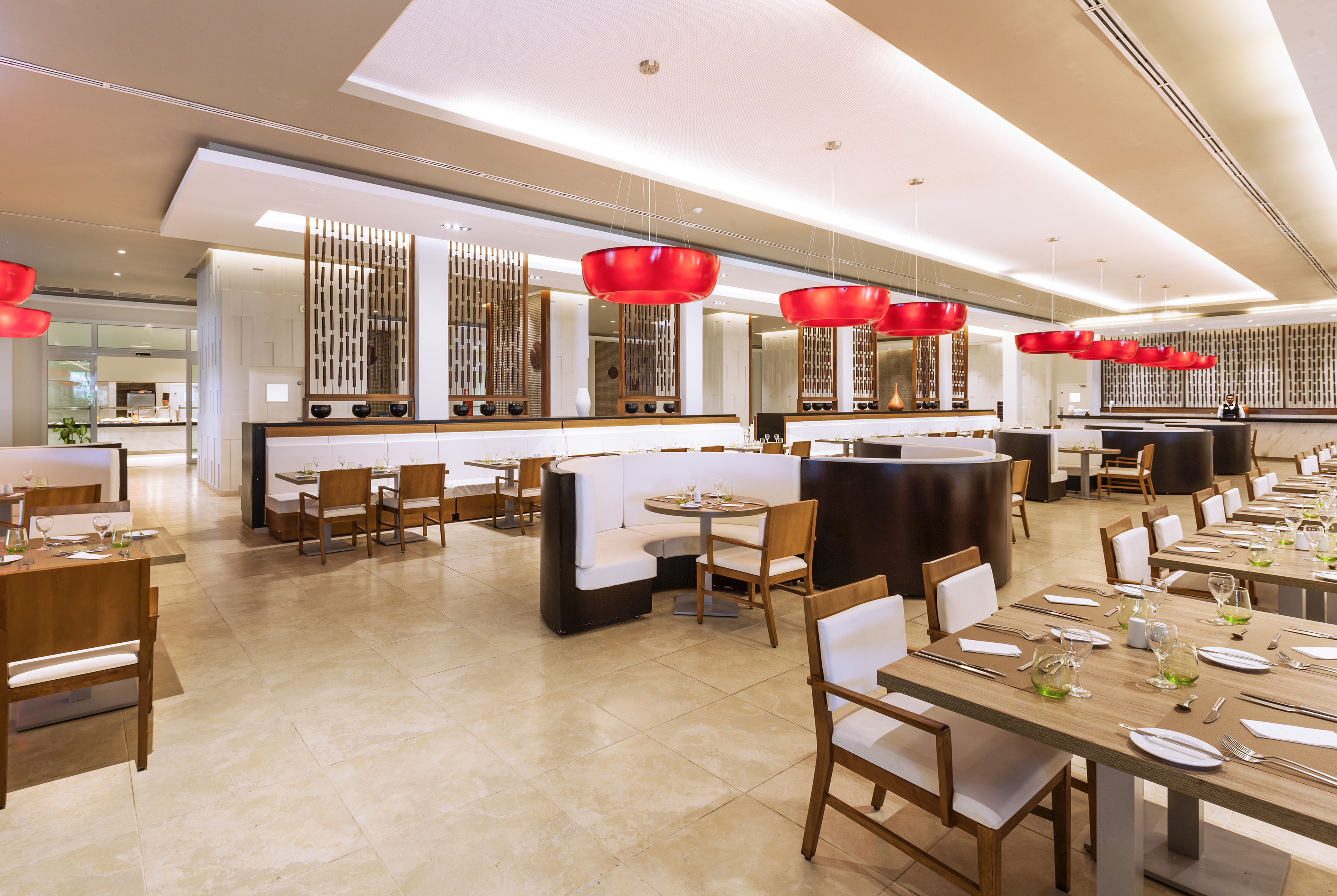 a restaurant with tables and chairs