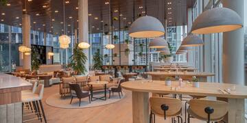 a large room with tables and chairs