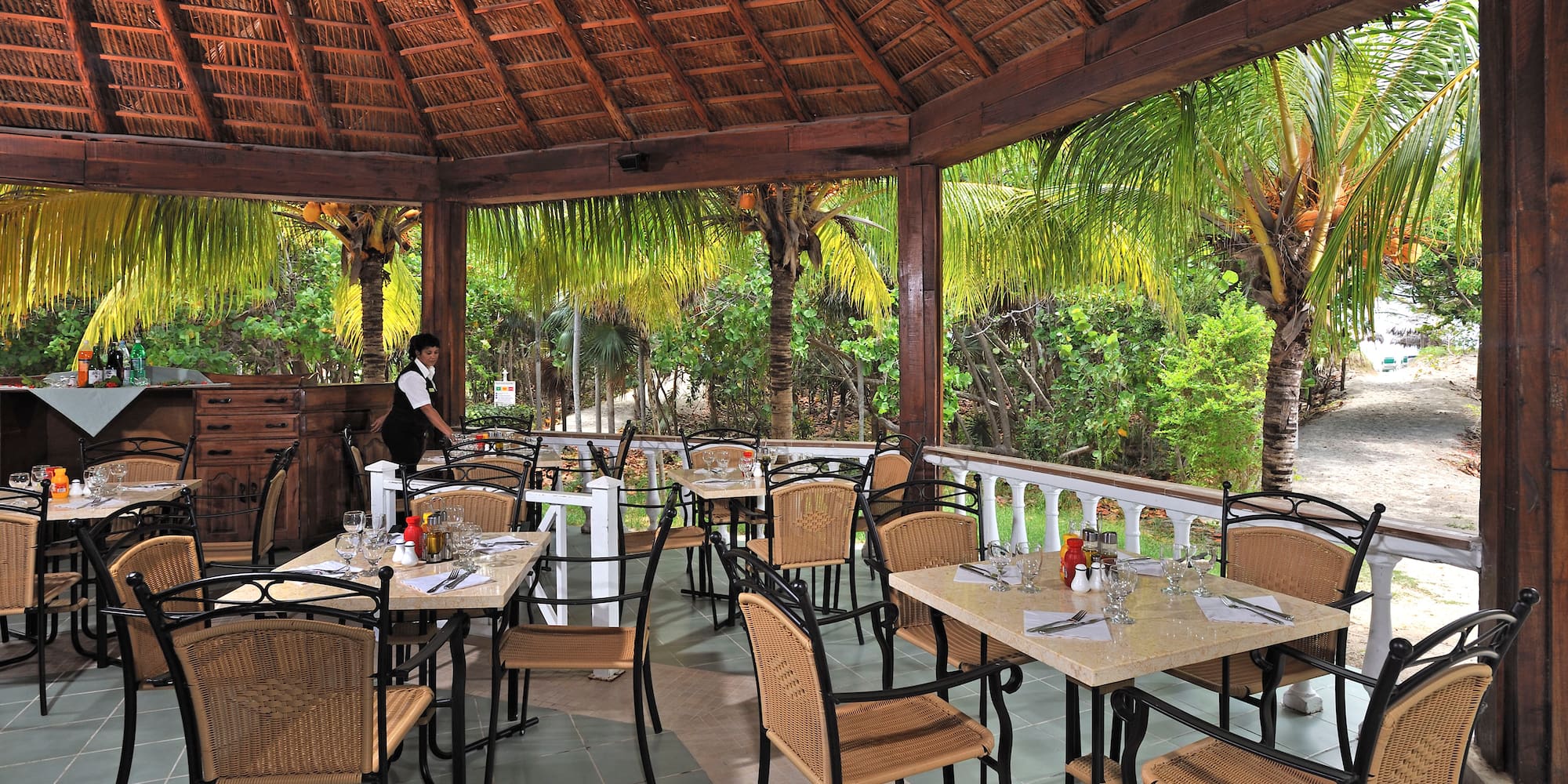 a restaurant with tables and chairs