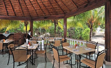 a restaurant with tables and chairs