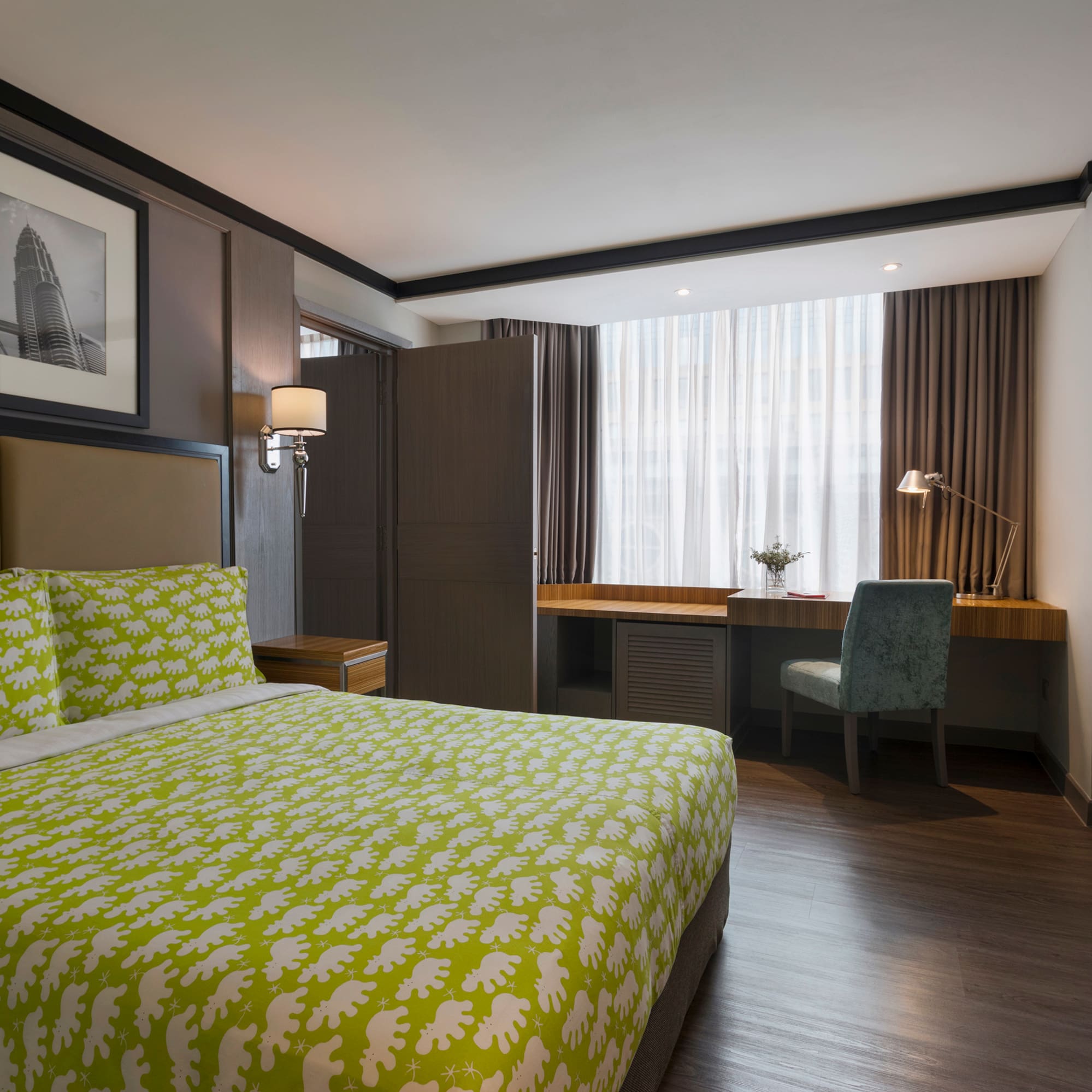 a room with a bed and a desk