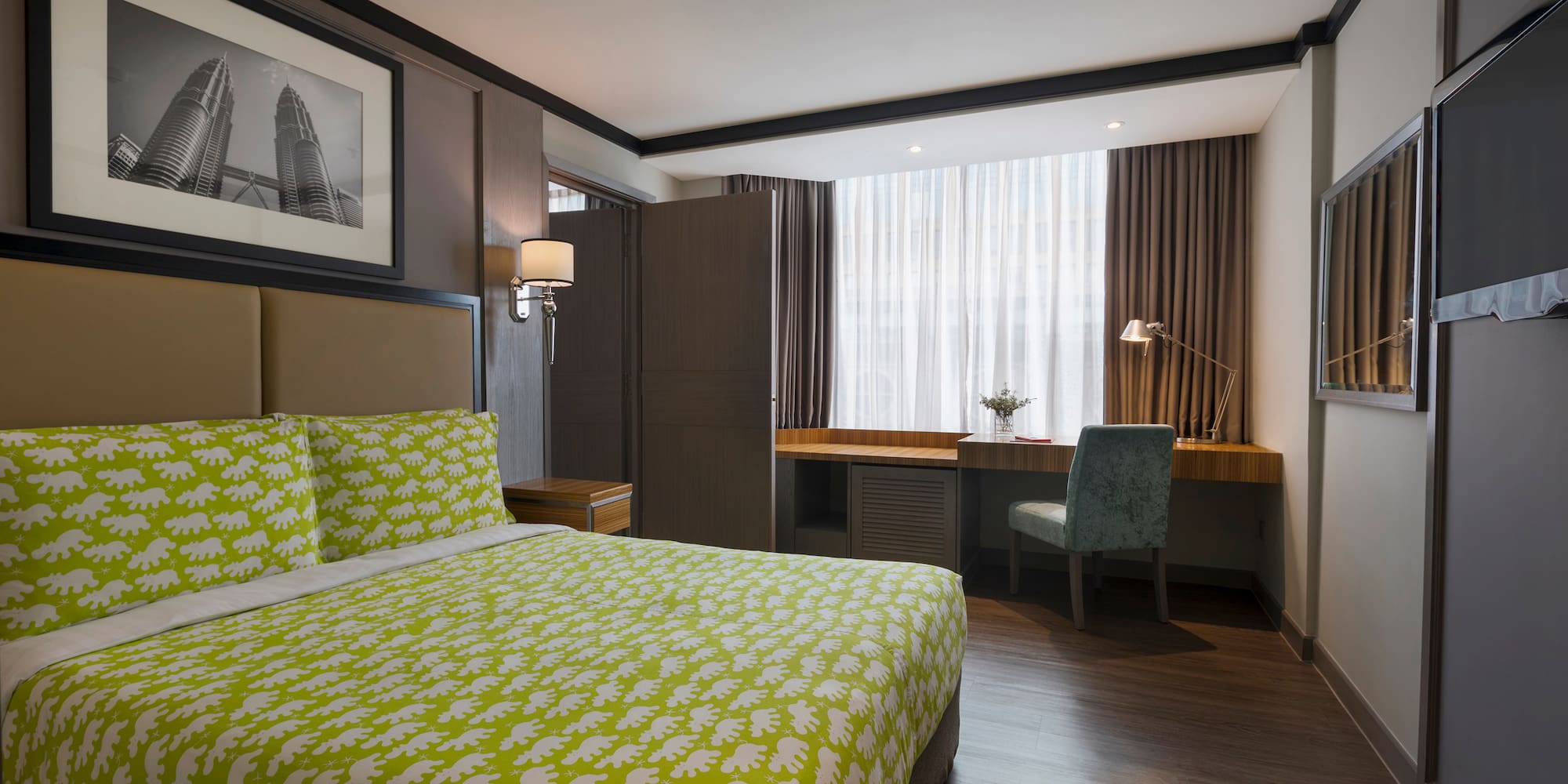 a room with a bed and a desk