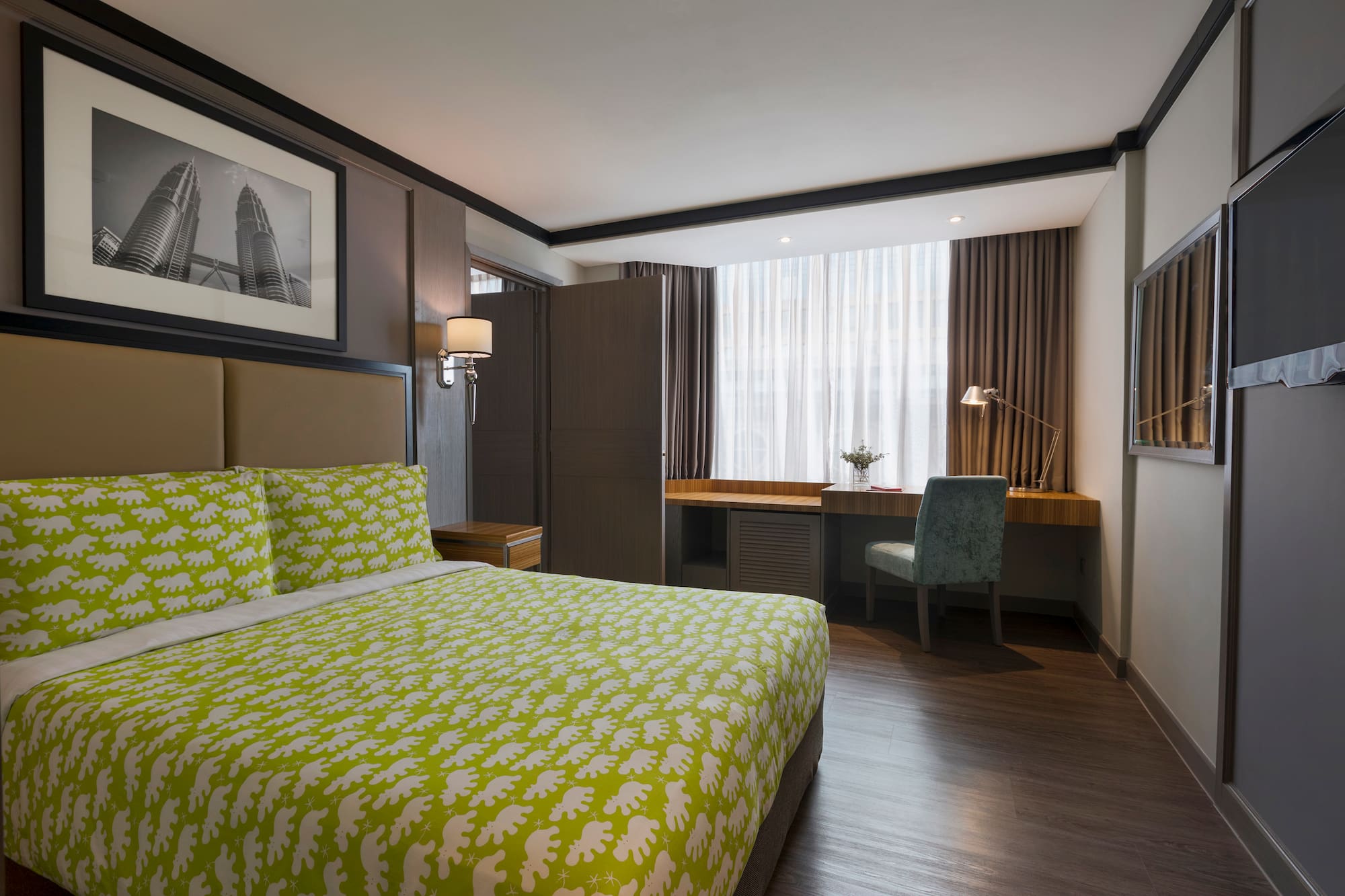 a room with a bed and a desk