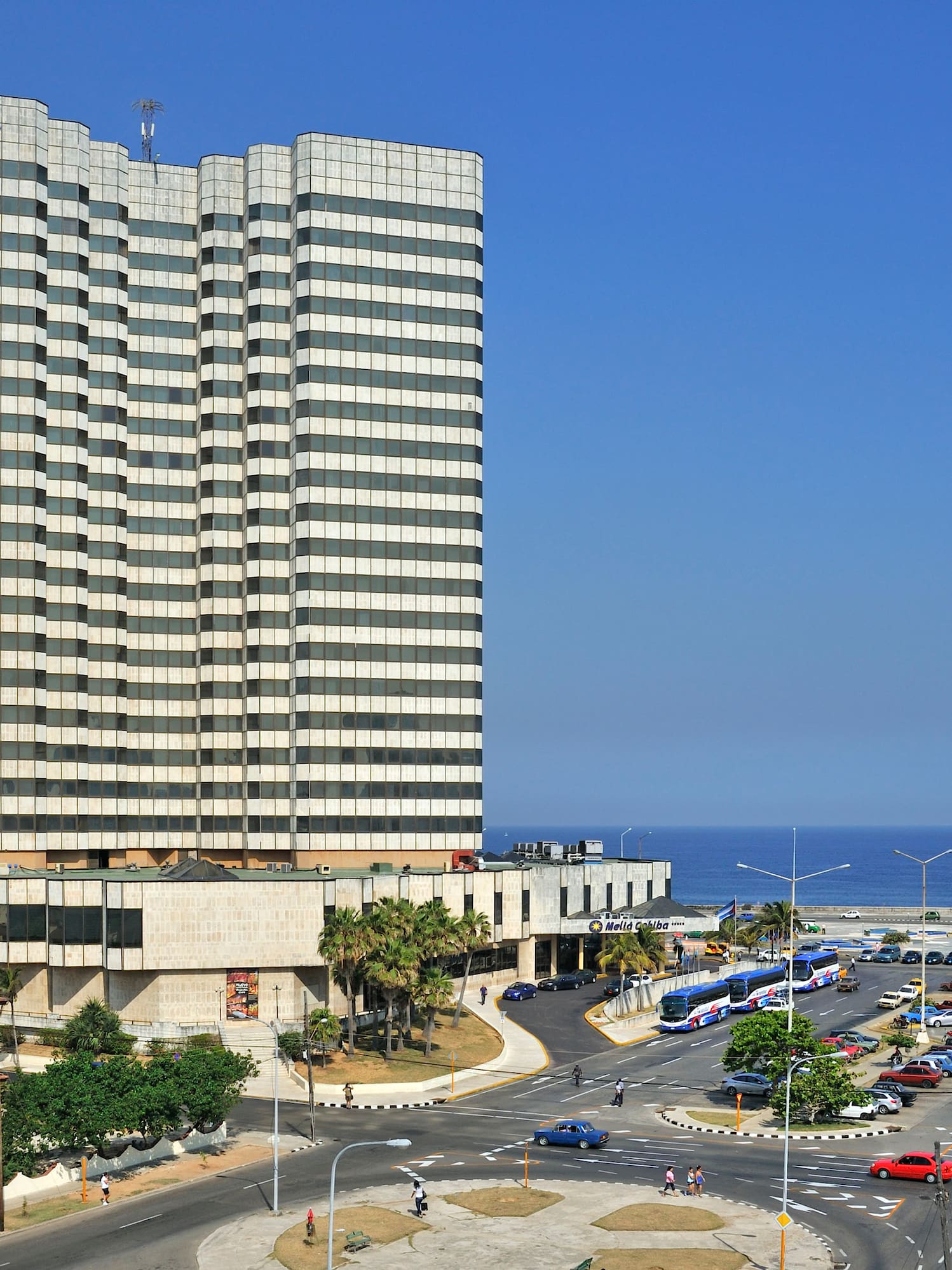 a large building next to a road