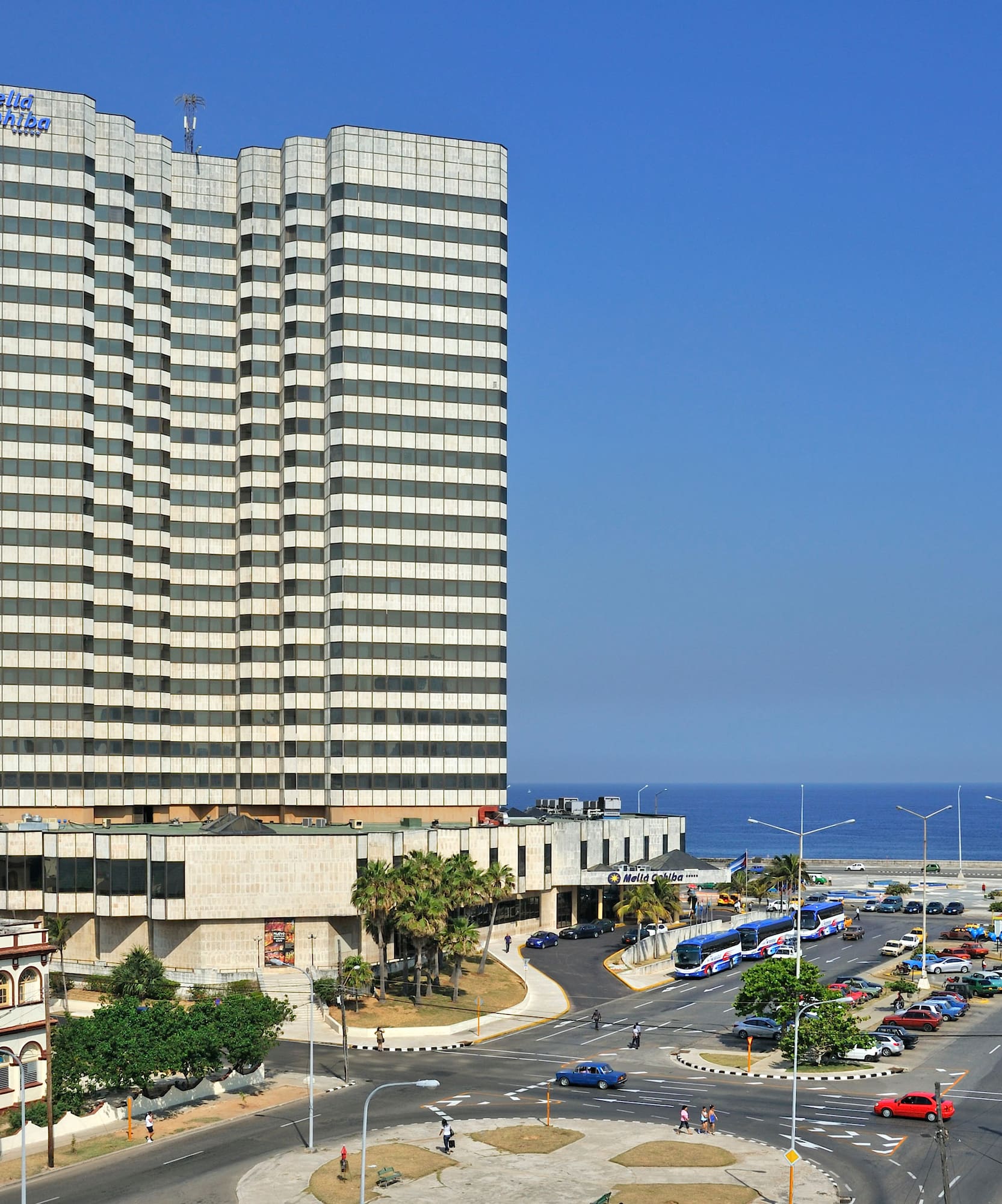 a large building next to a road