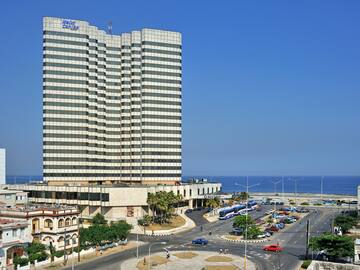 a large building next to a road