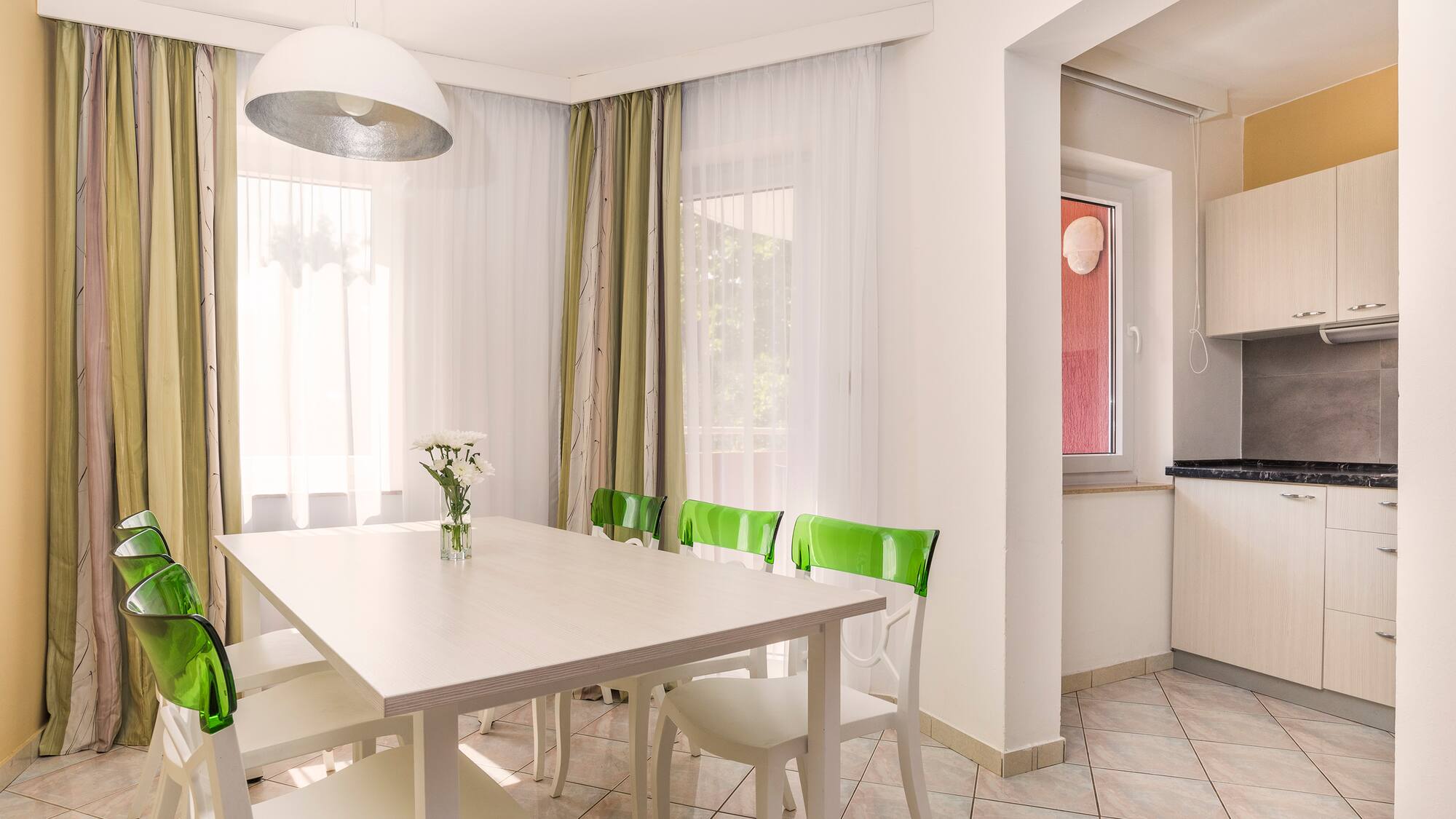 a white table and chairs in a room