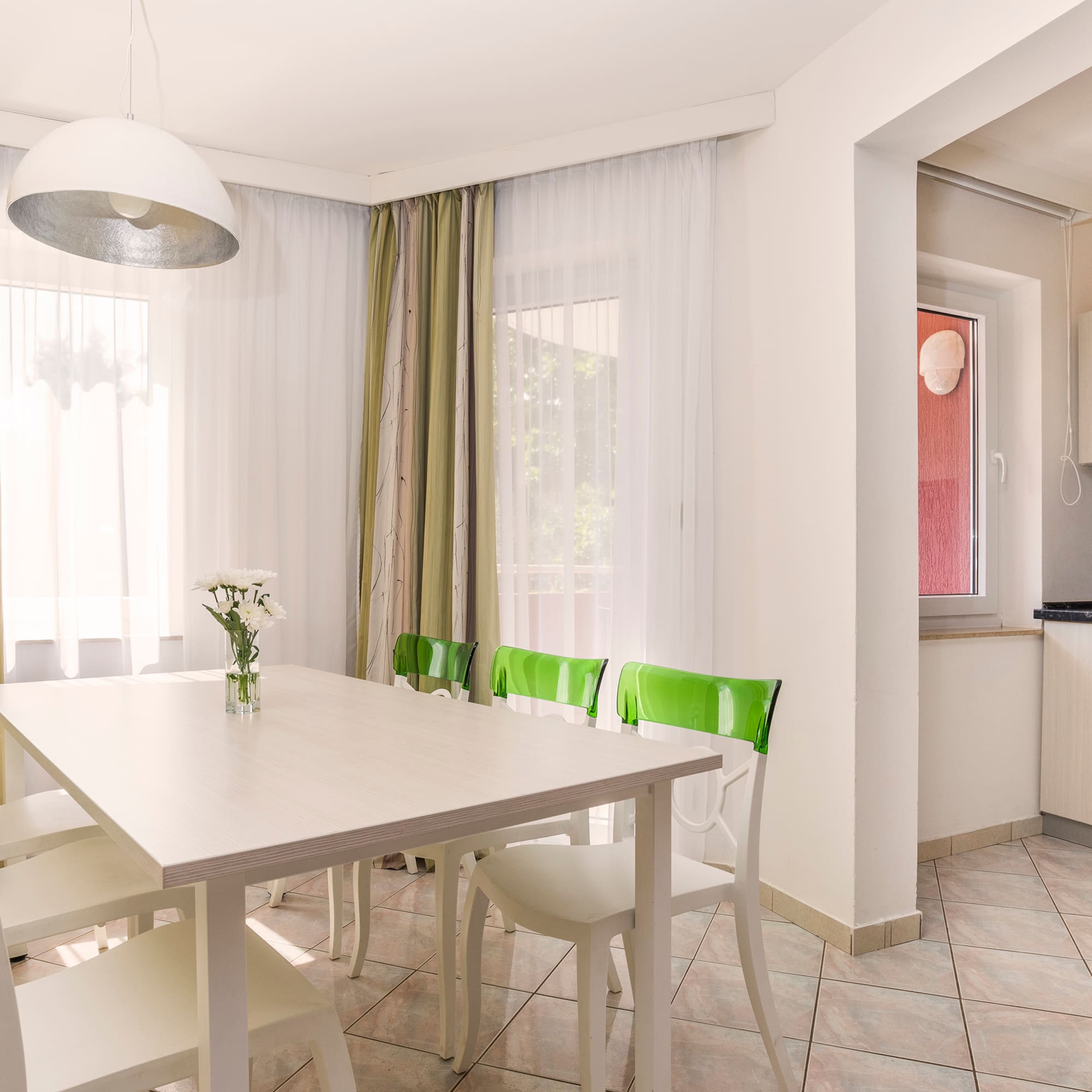 a white table and chairs in a room