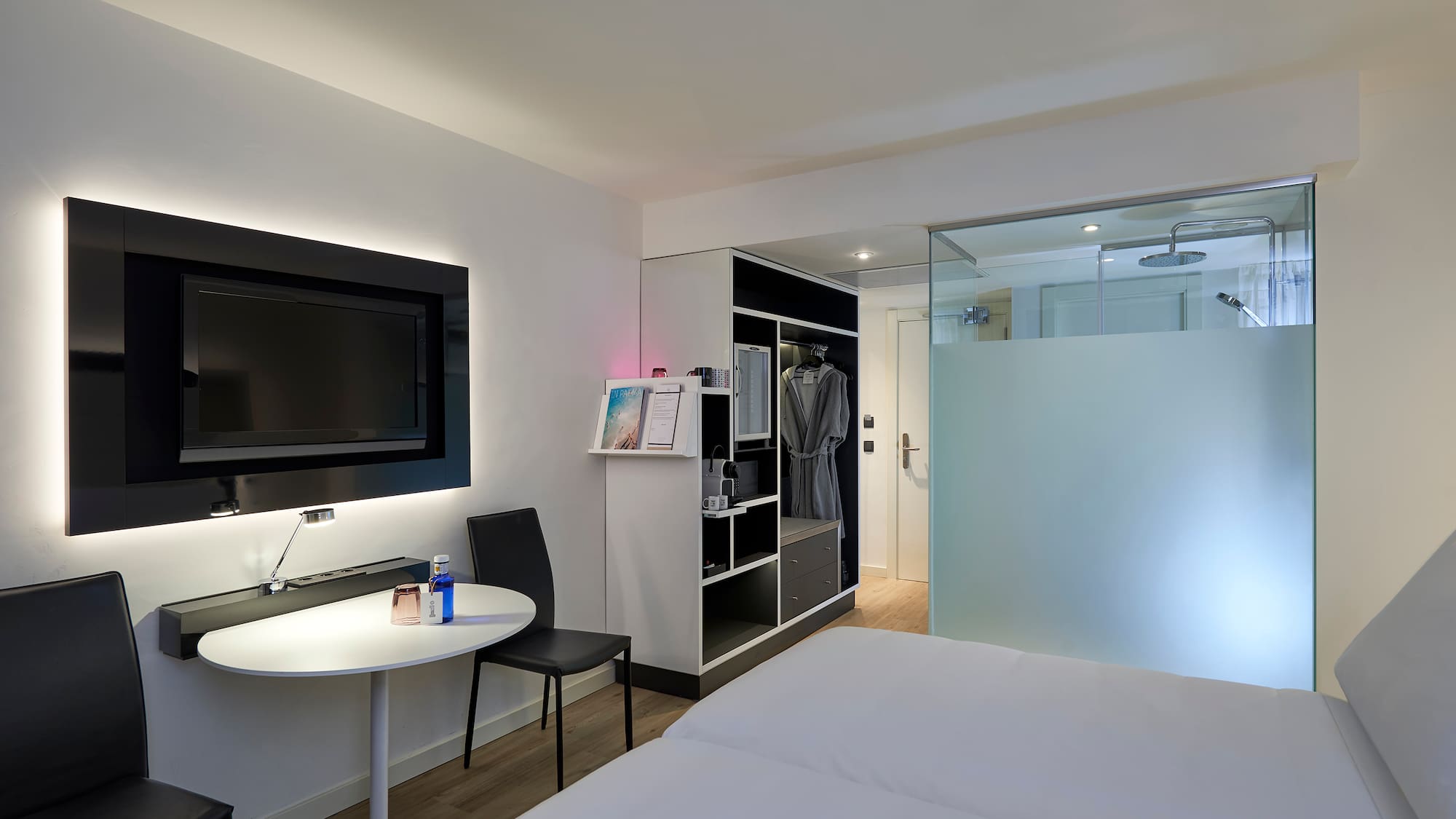 a room with a tv and a table