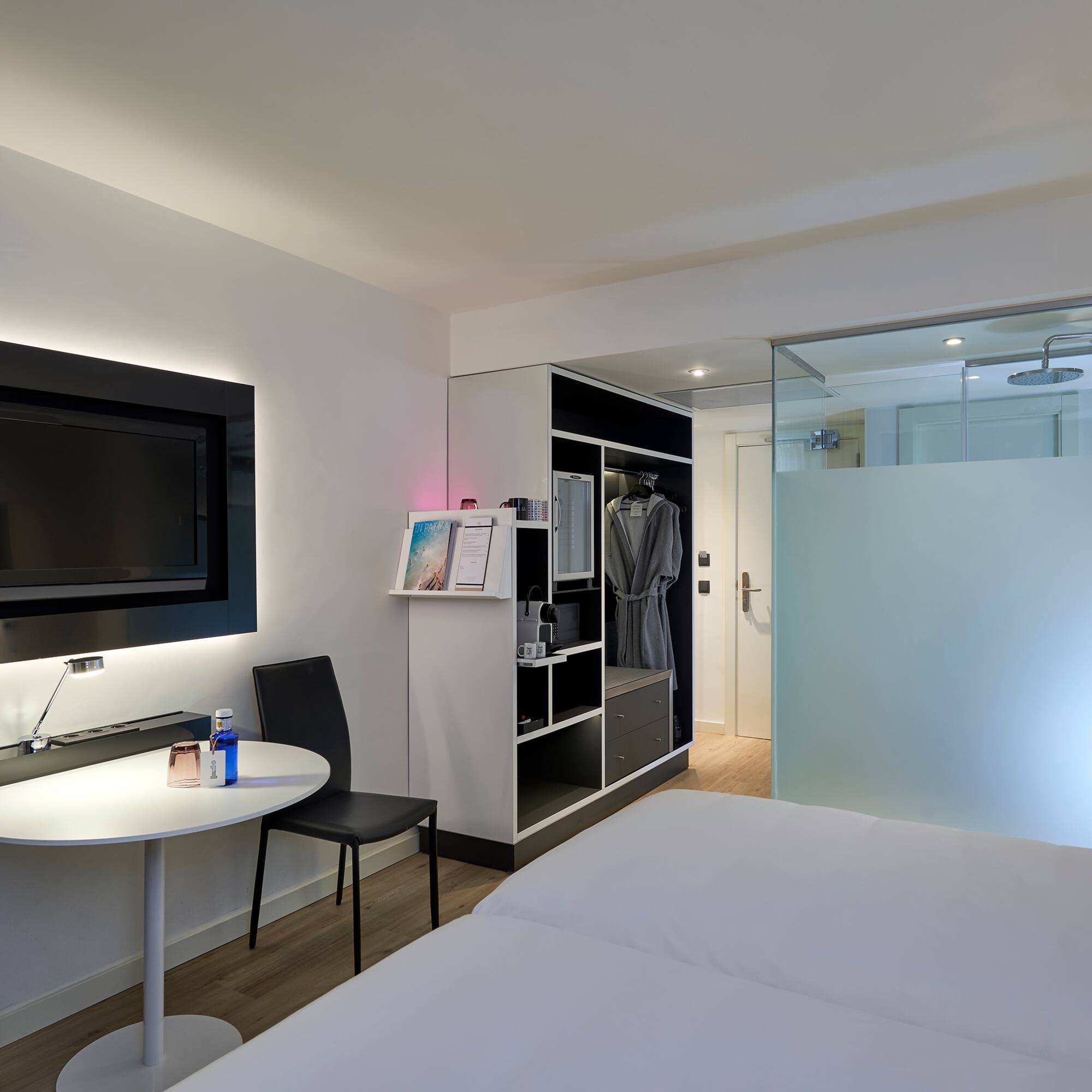 a room with a tv and a table