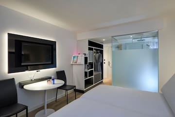 a room with a tv and a table