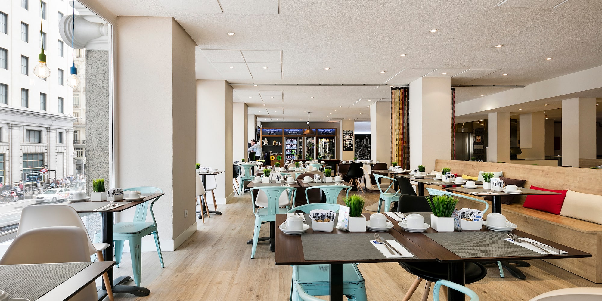 a restaurant with tables and chairs