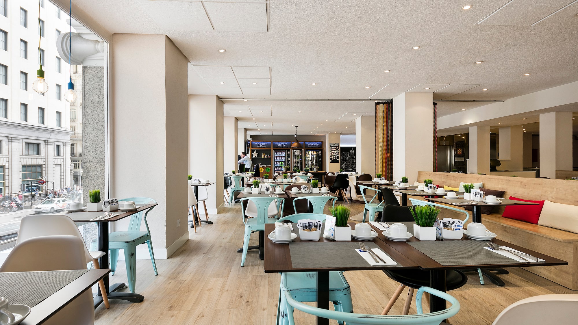 a restaurant with tables and chairs