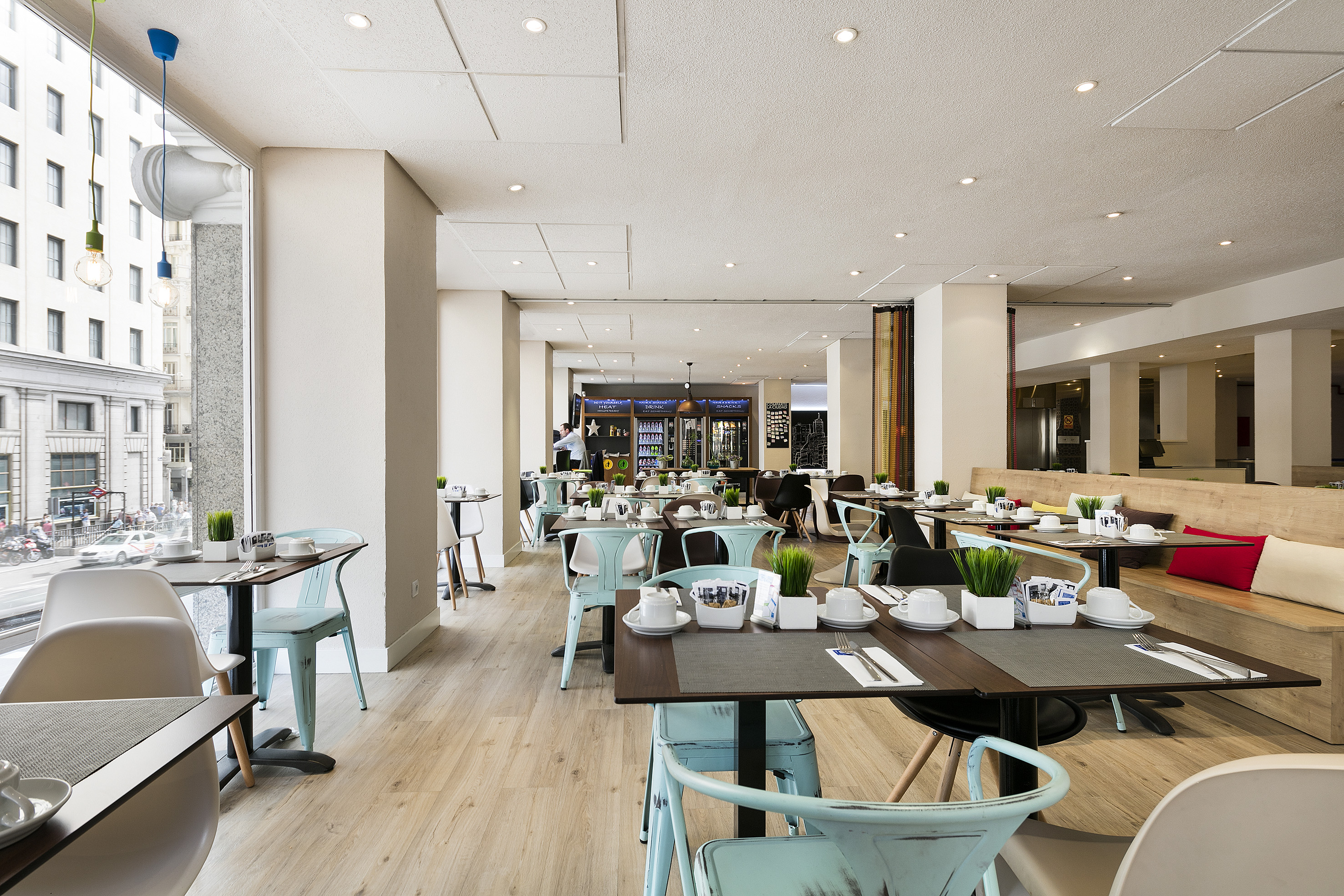 a restaurant with tables and chairs