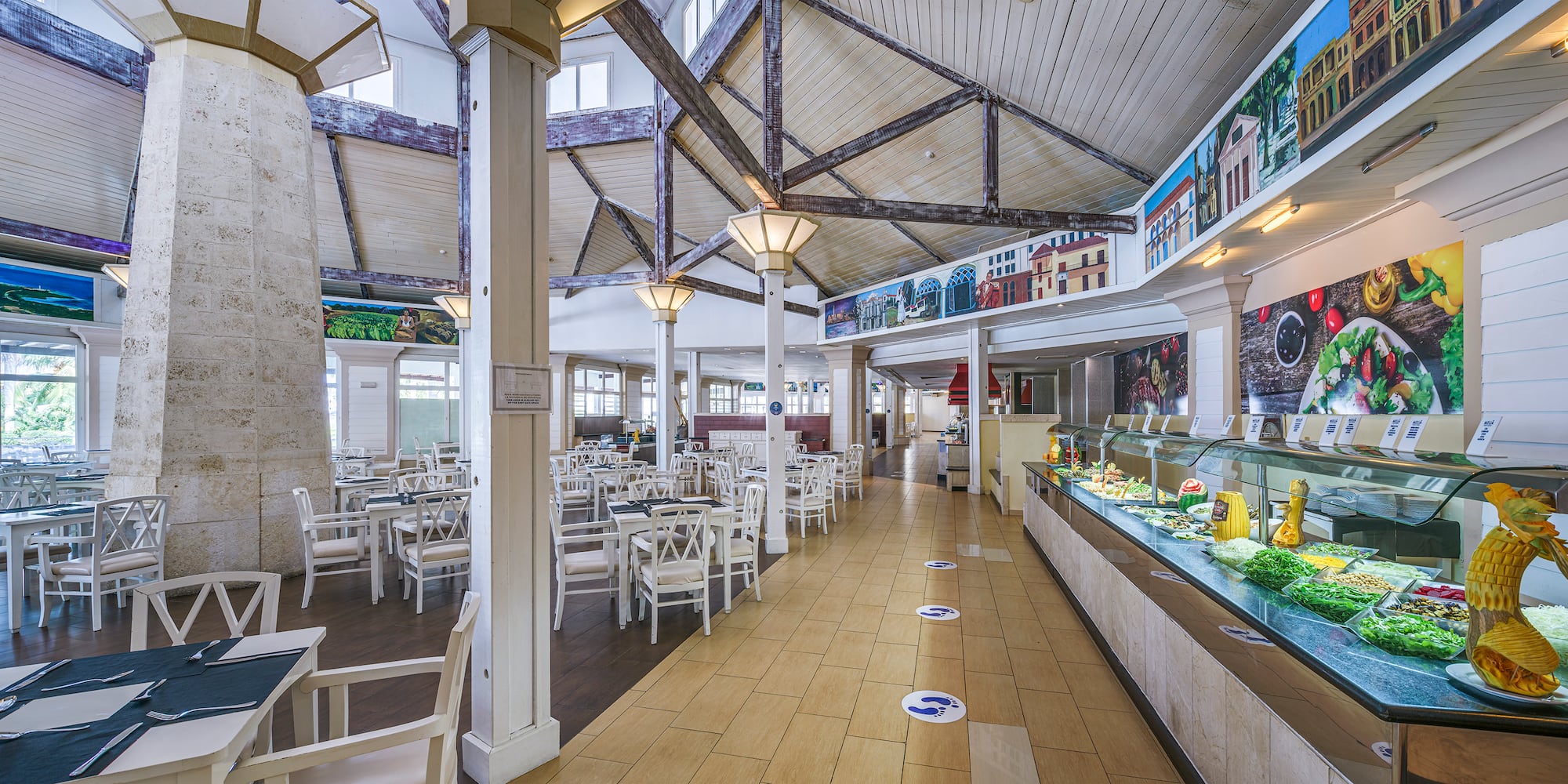 a restaurant with tables and chairs