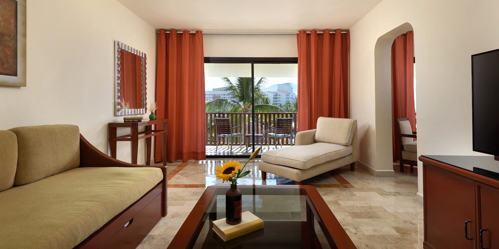 a living room with a couch and a table