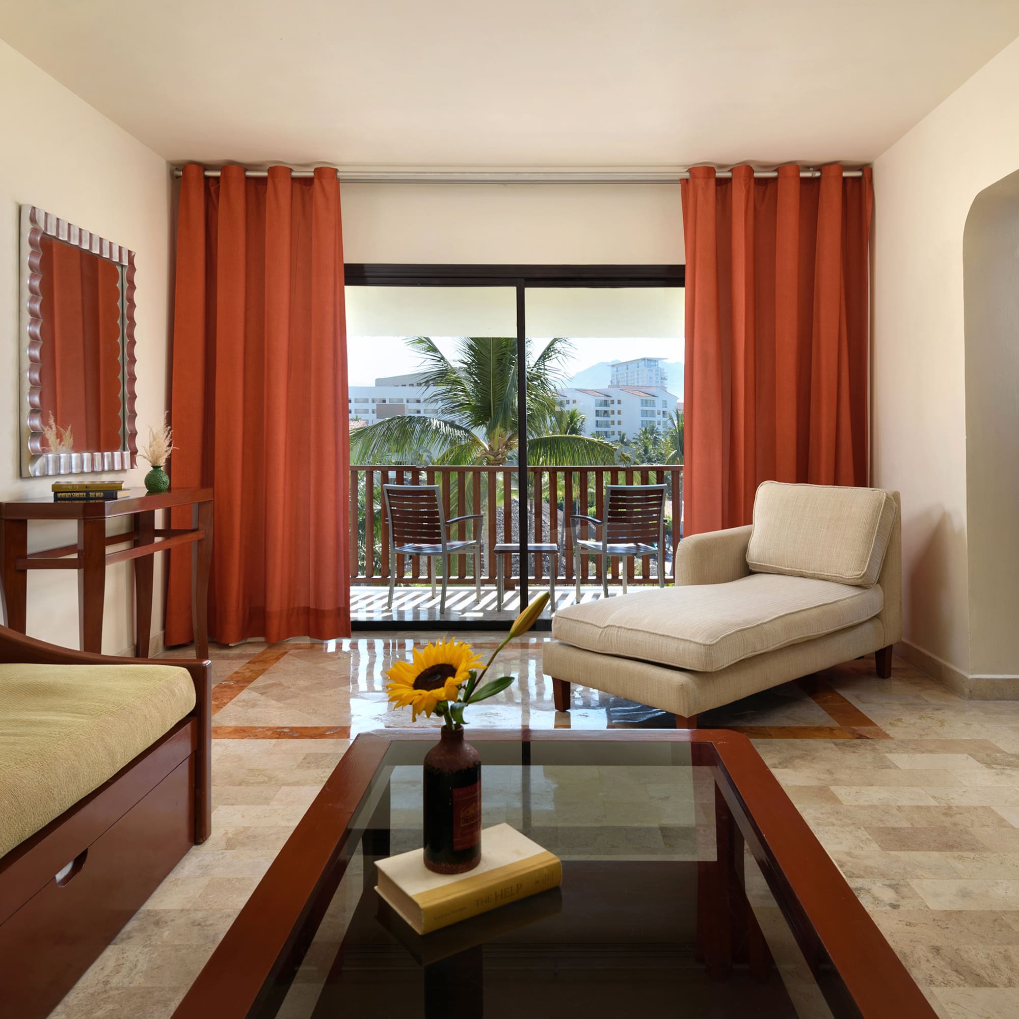 a living room with a couch and a table