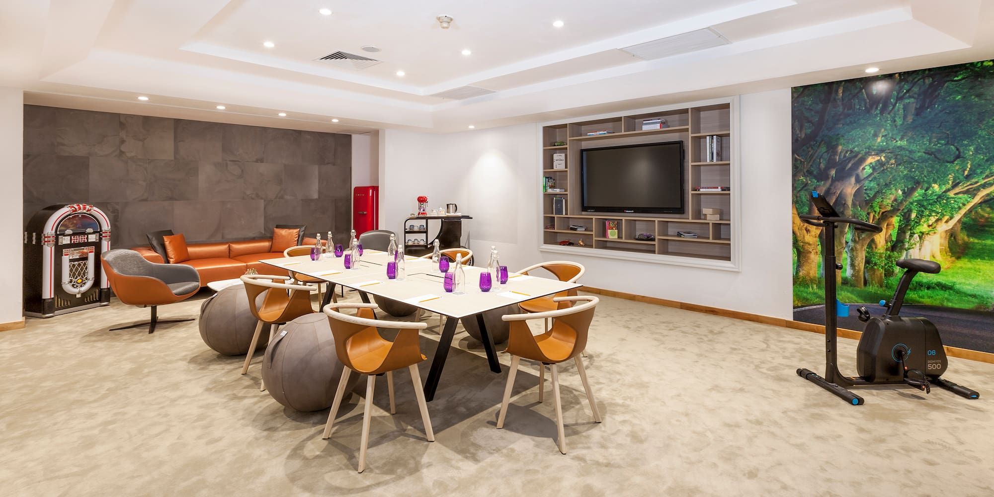 a room with a table and chairs