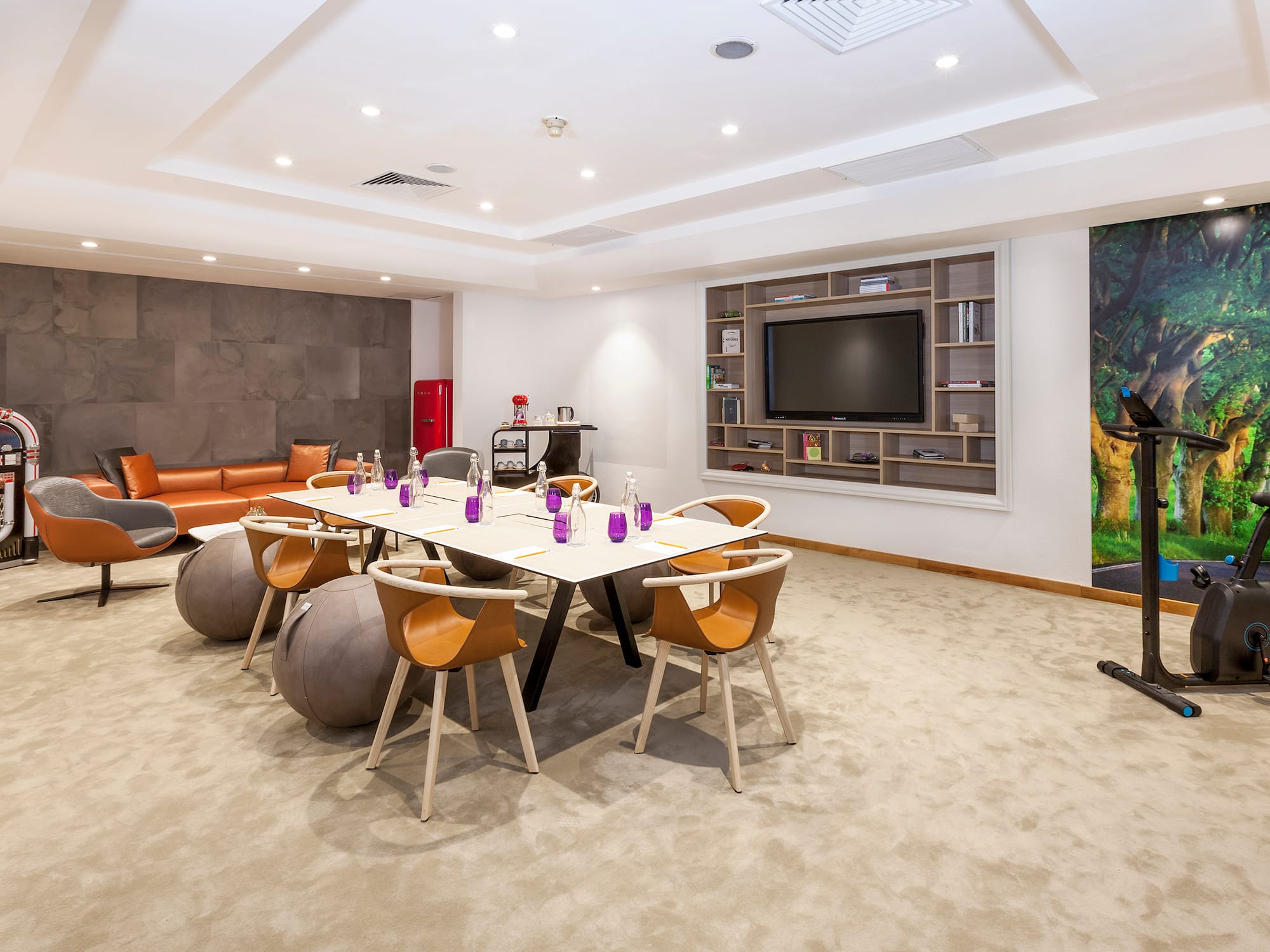 a room with a table and chairs