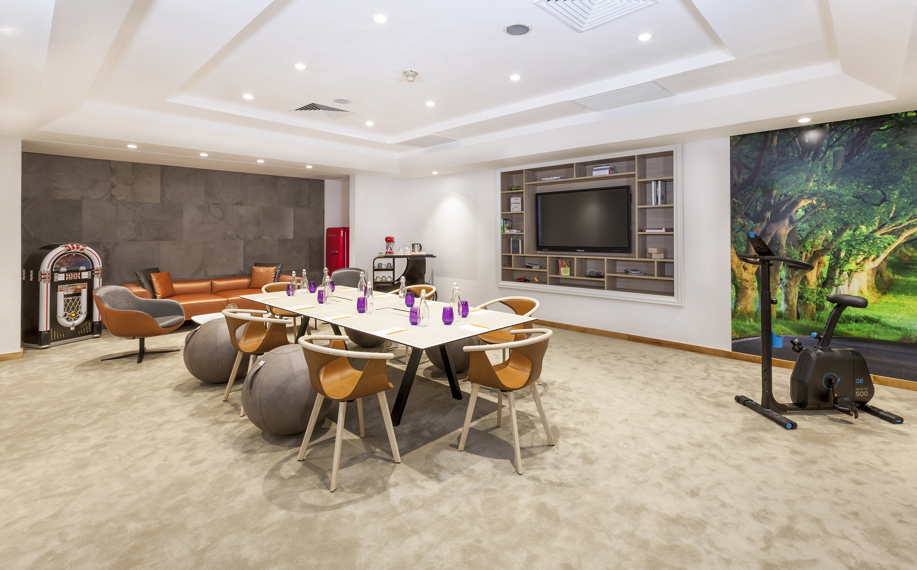 a room with a table and chairs