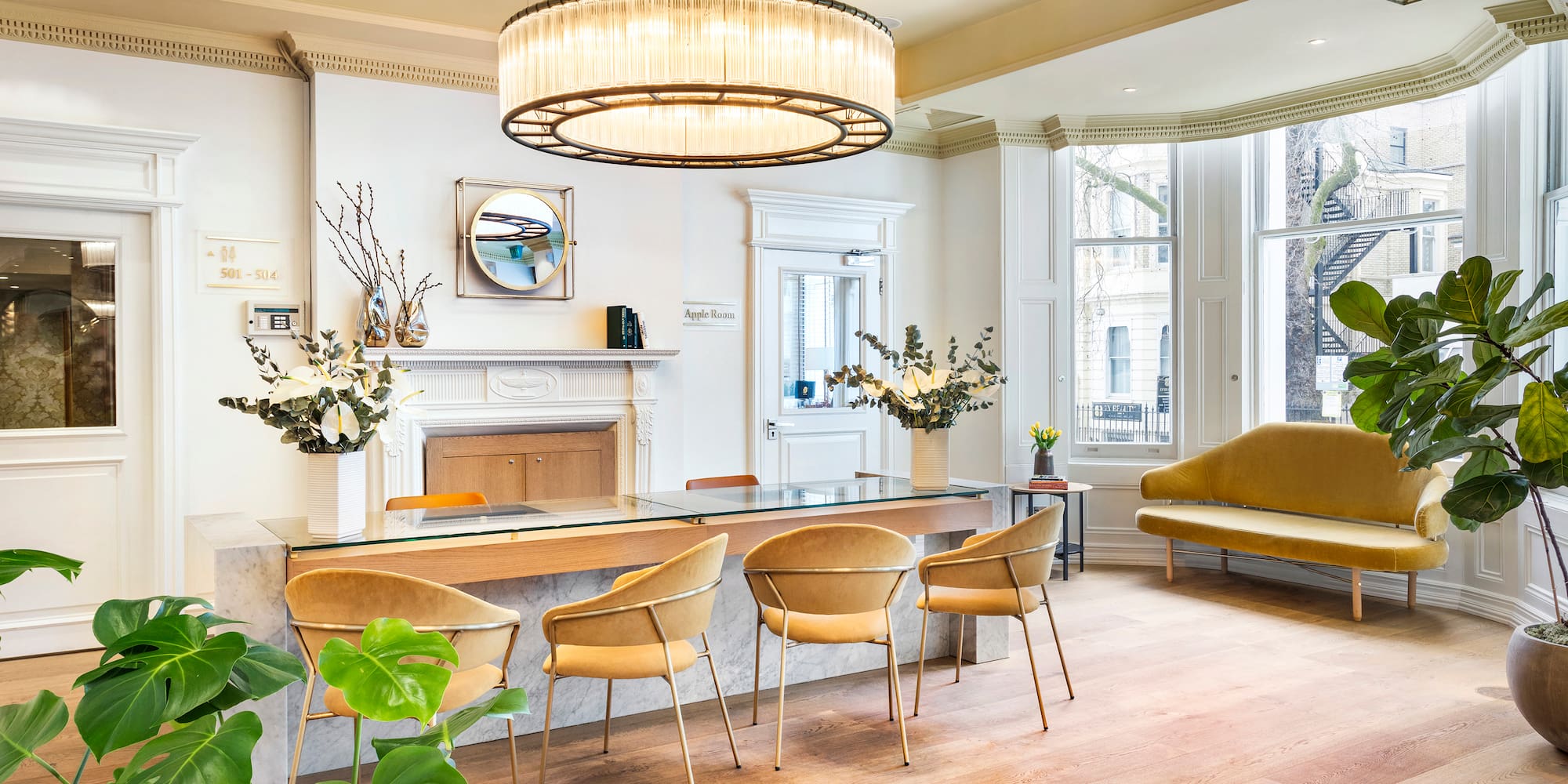 a room with a table and chairs