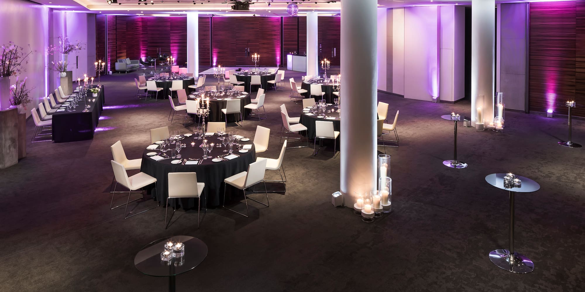 a room with tables and chairs