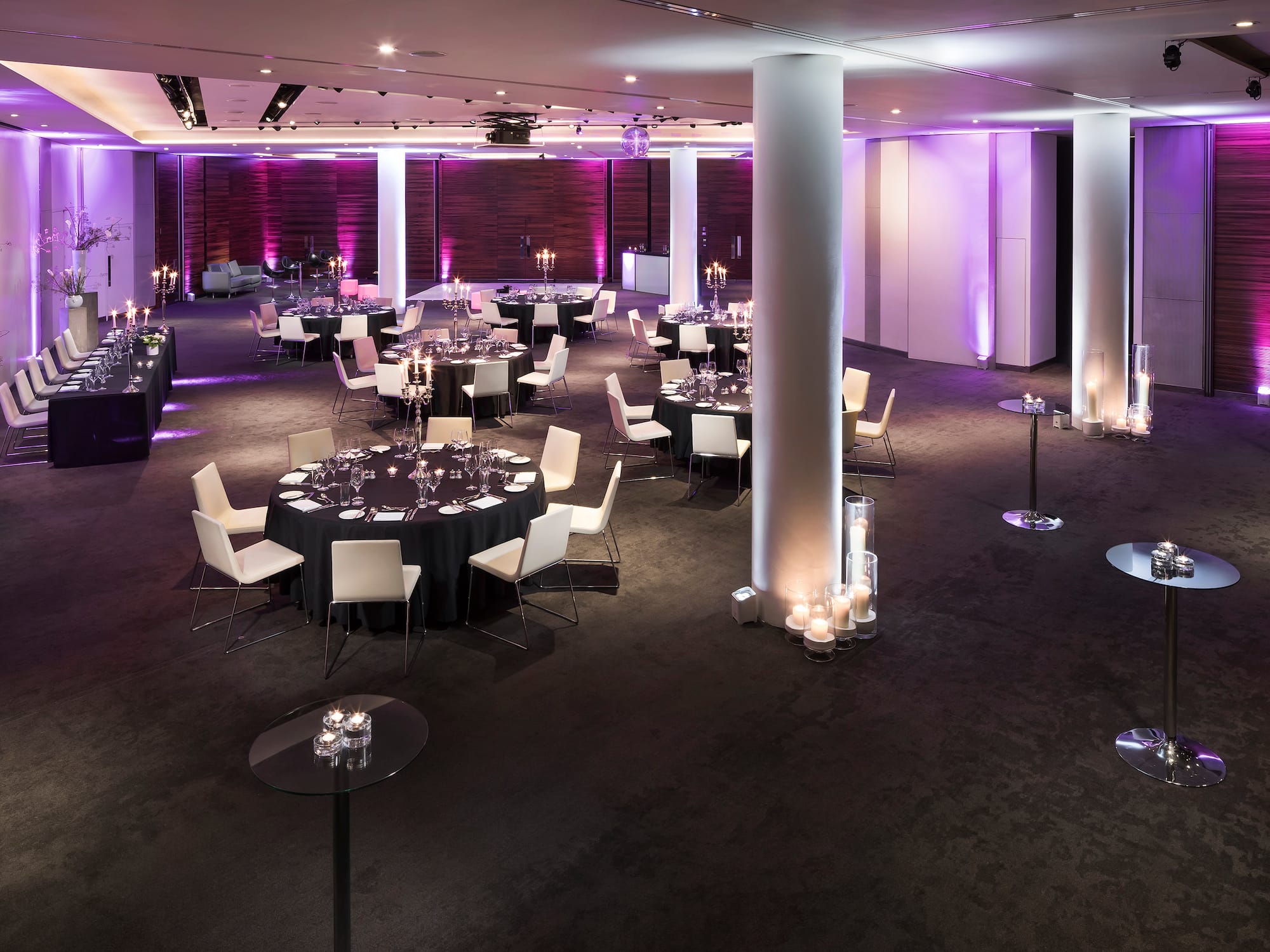 a room with tables and chairs