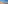 Sunny sandy beach, blue ocean waves, white hillside homes, and coastal fort.