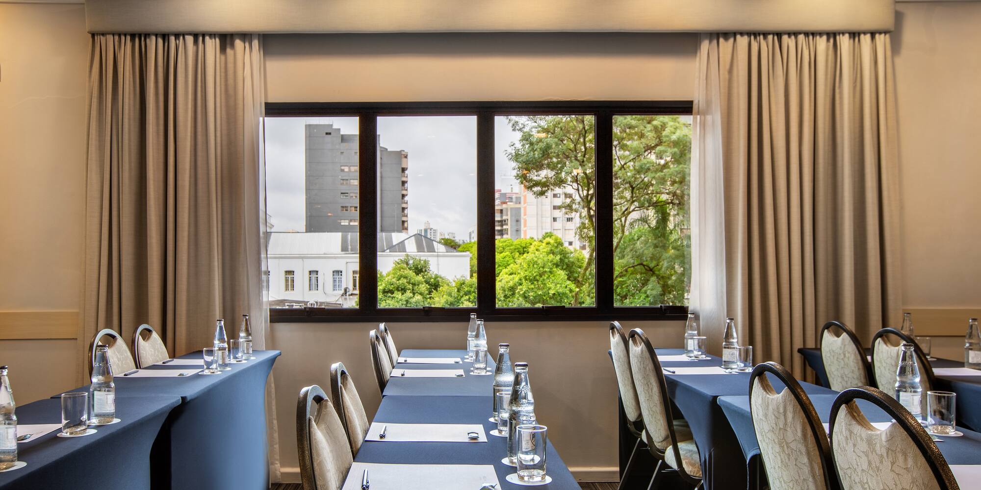 a room with tables and chairs