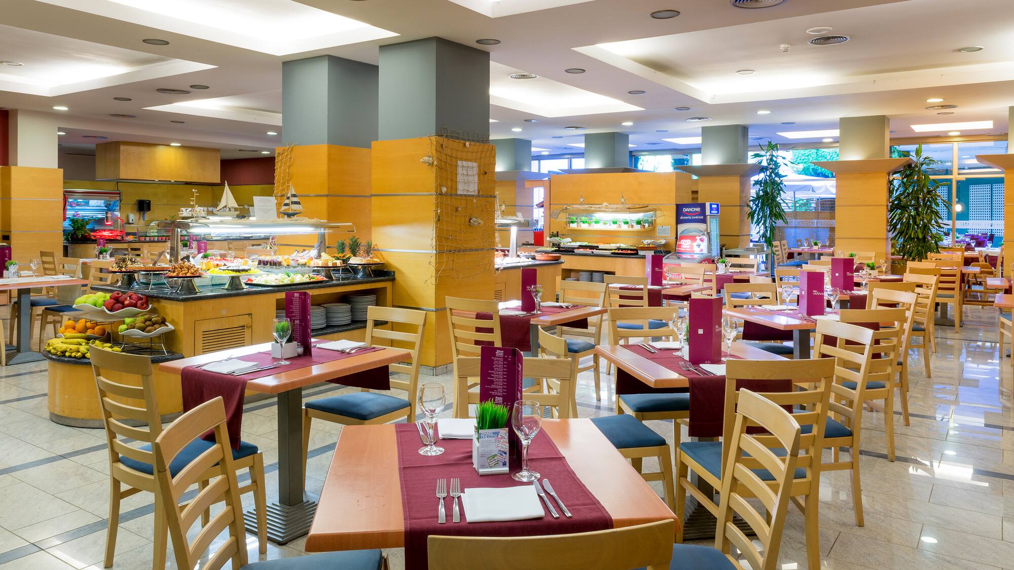 a restaurant with tables and chairs