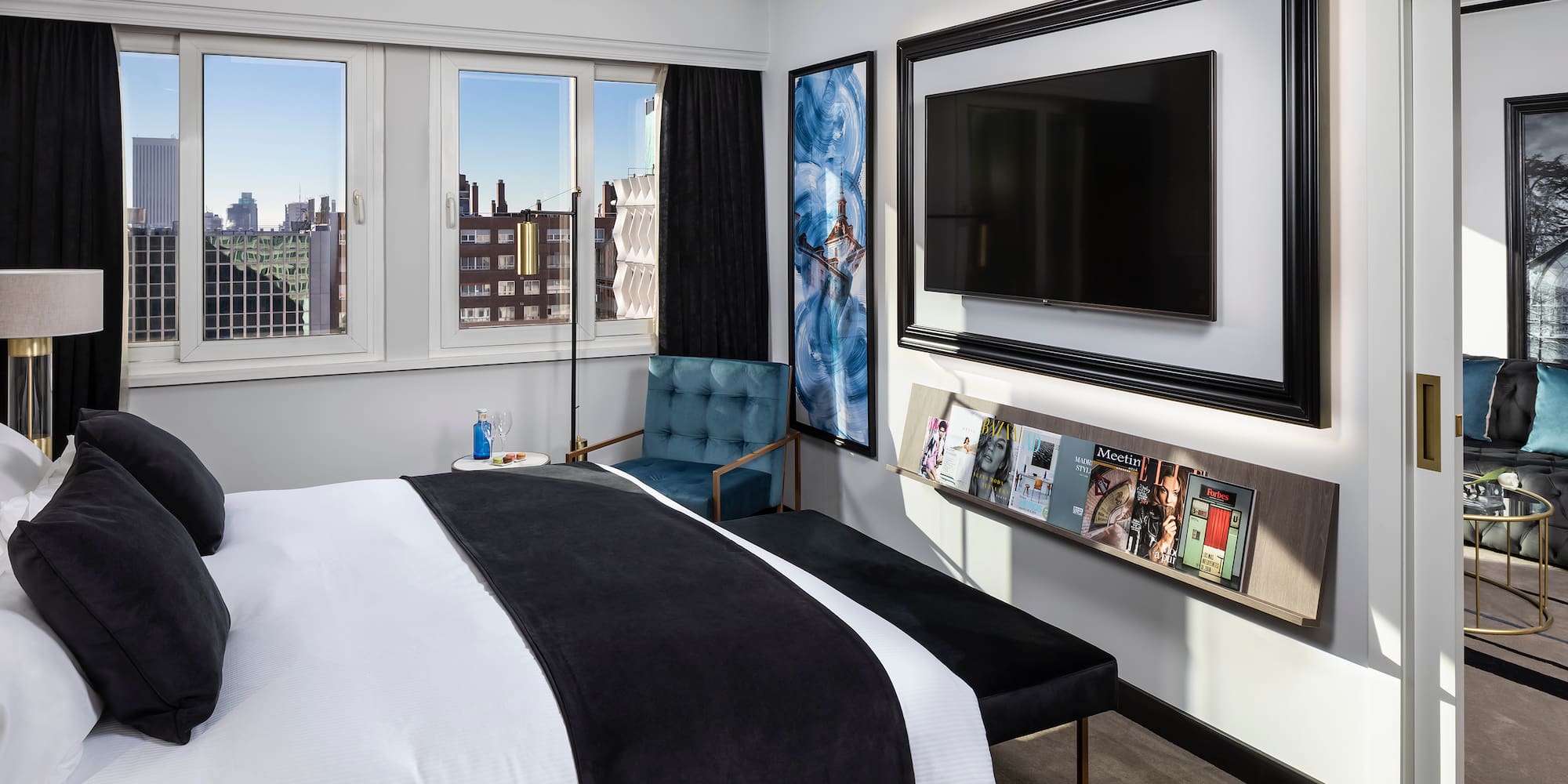 a bedroom with a bed and a chair