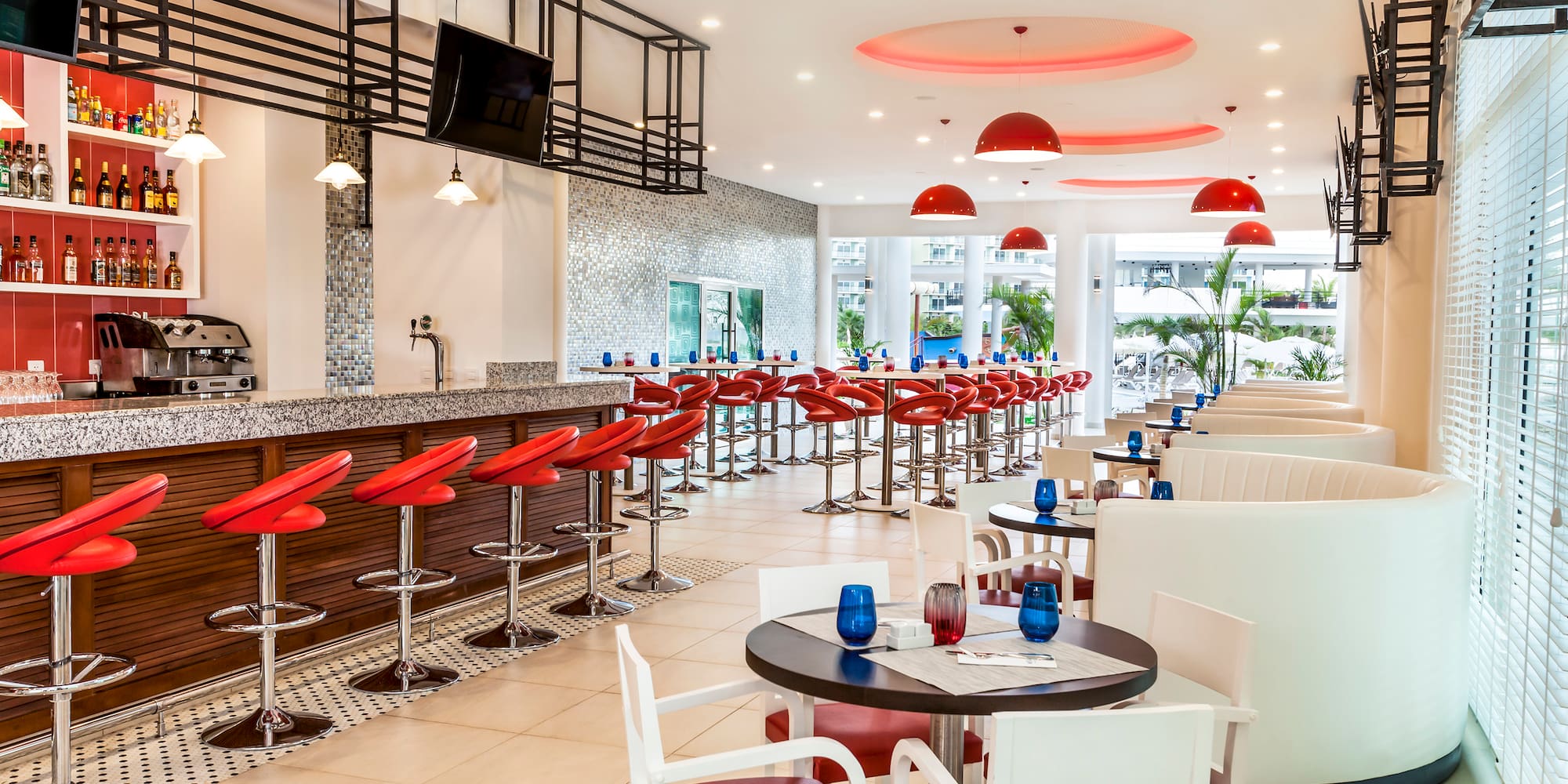 a restaurant with tables and chairs