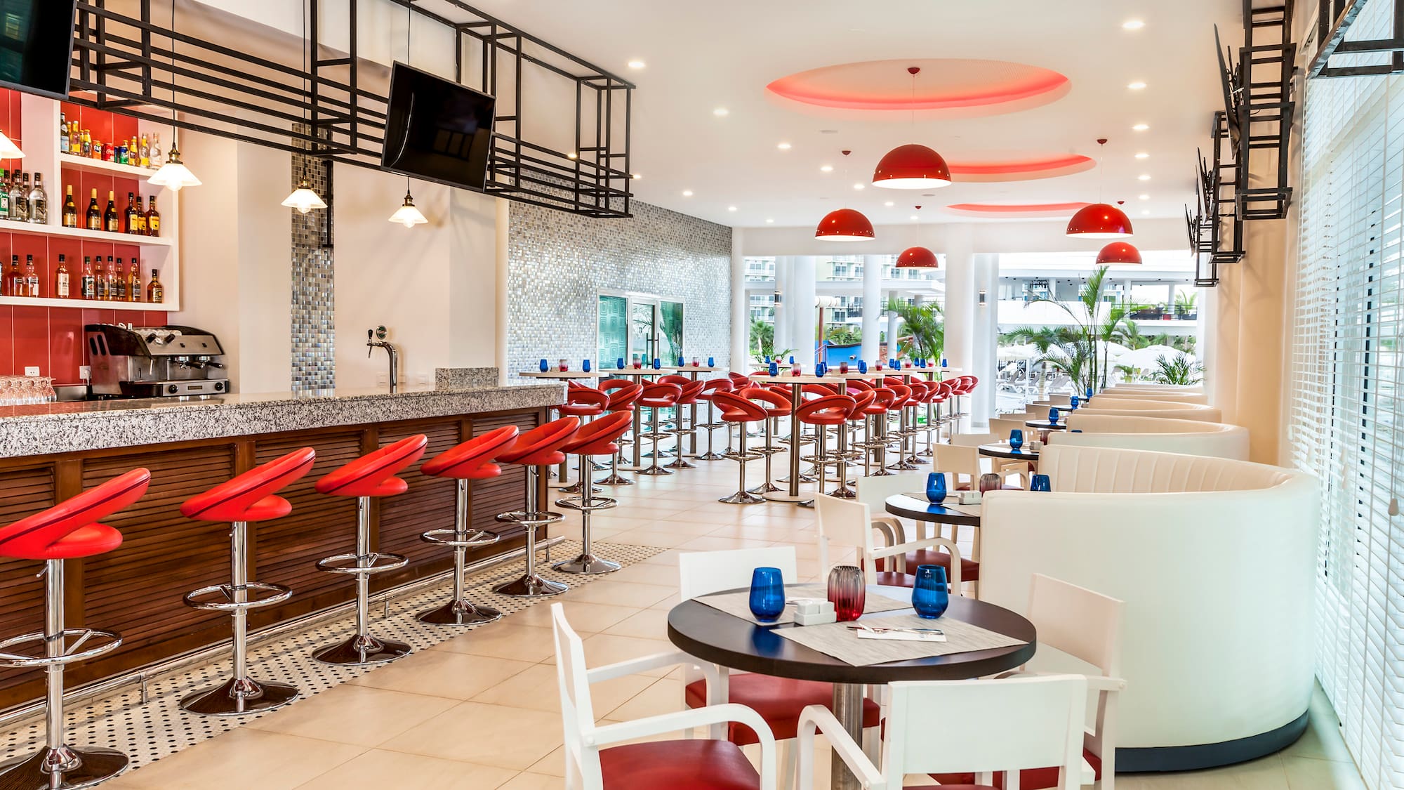 a restaurant with tables and chairs