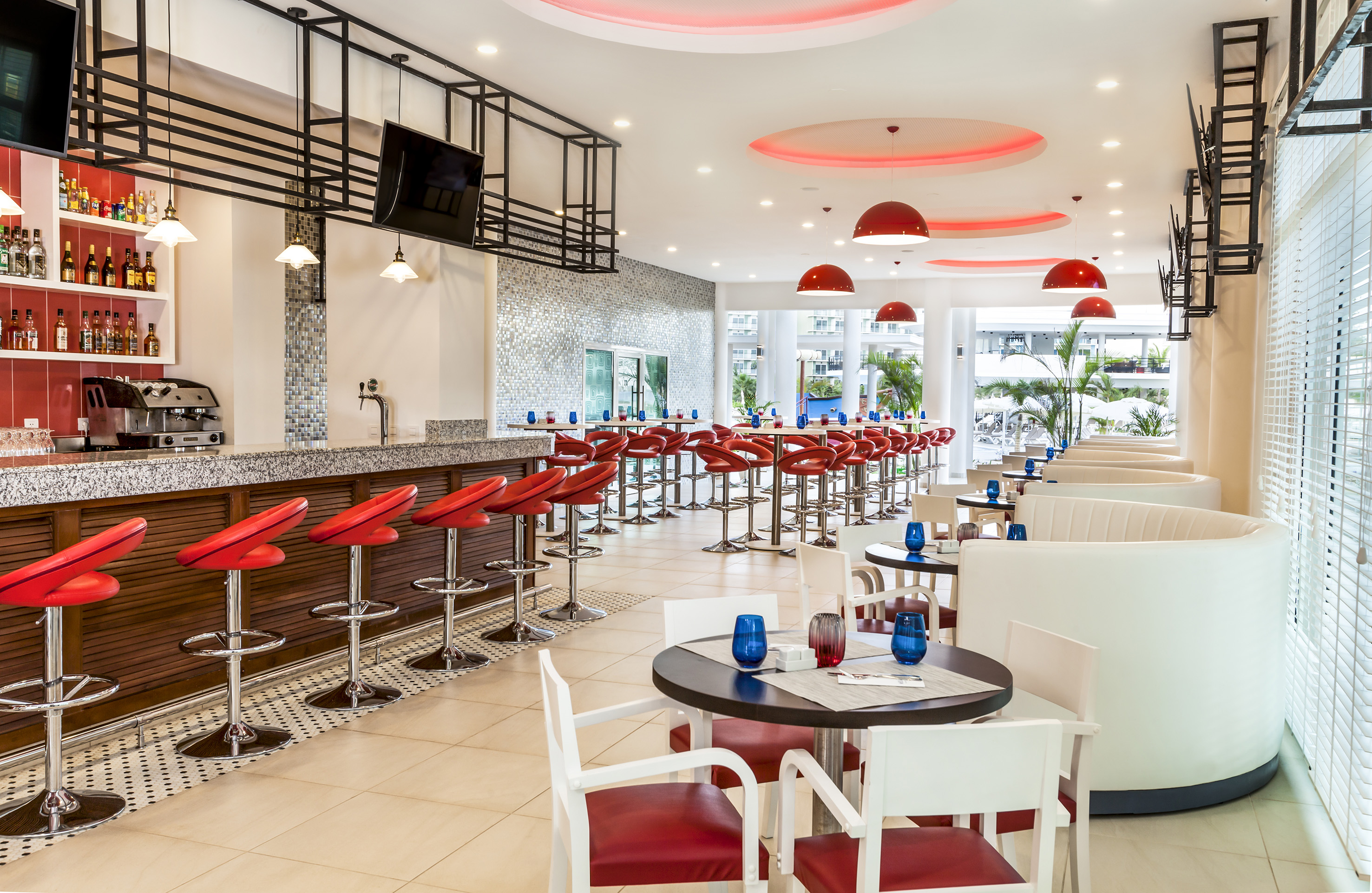 a restaurant with tables and chairs