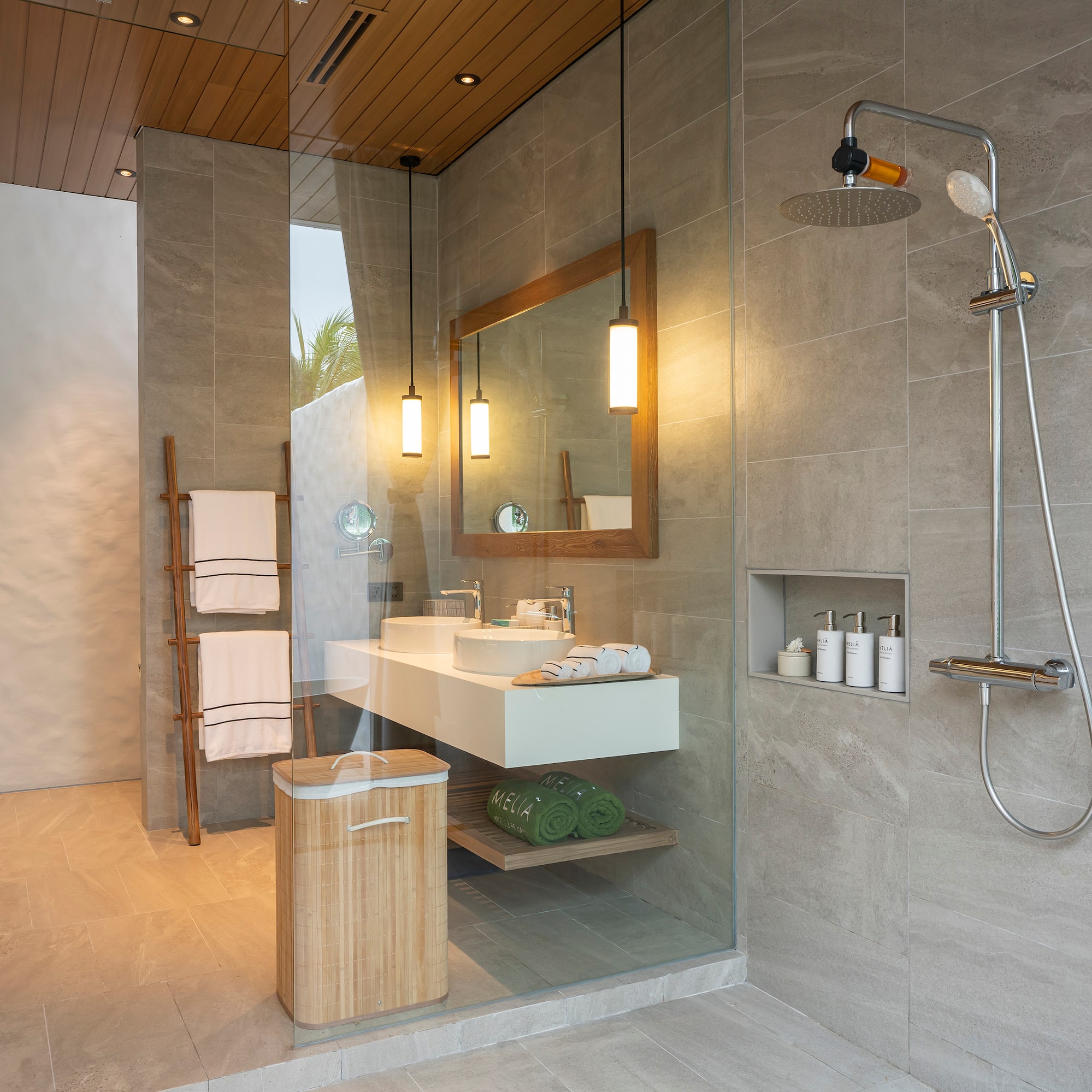 a bathroom with a shower and sink