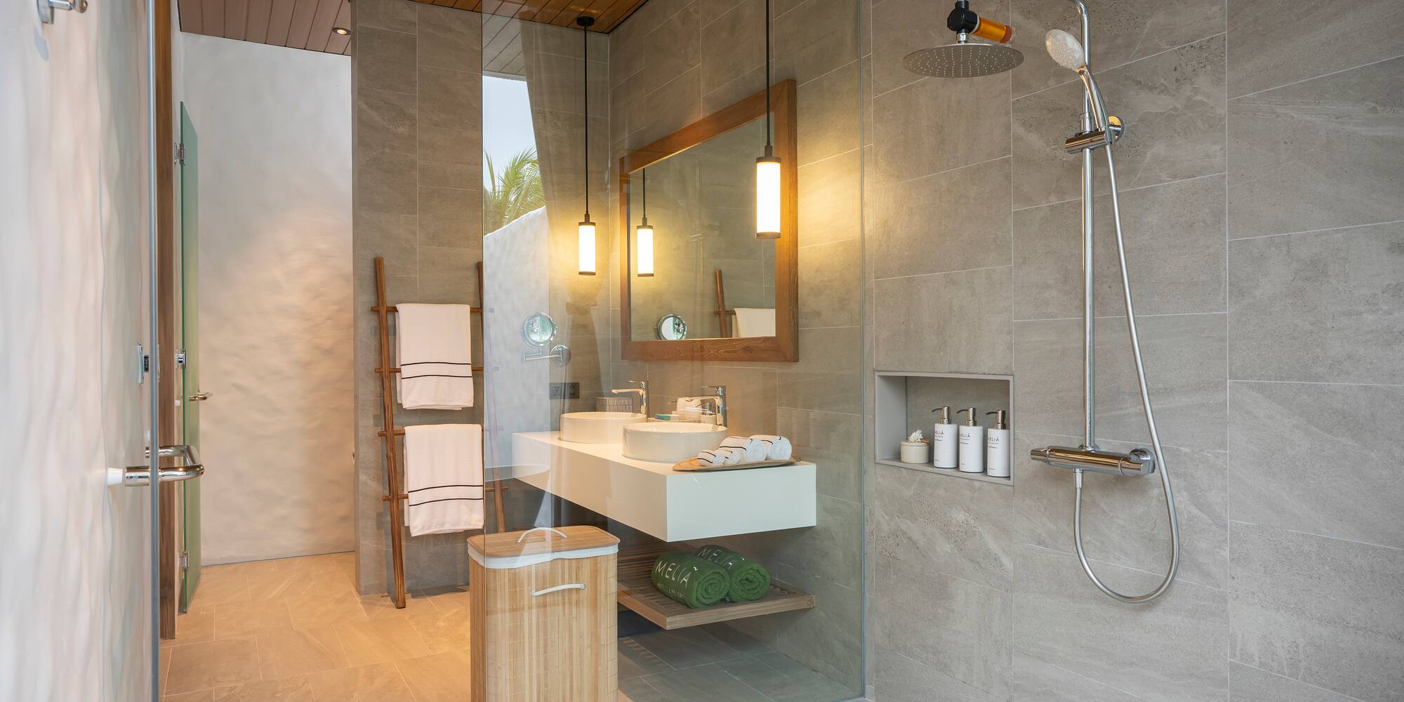 a bathroom with a shower and sink