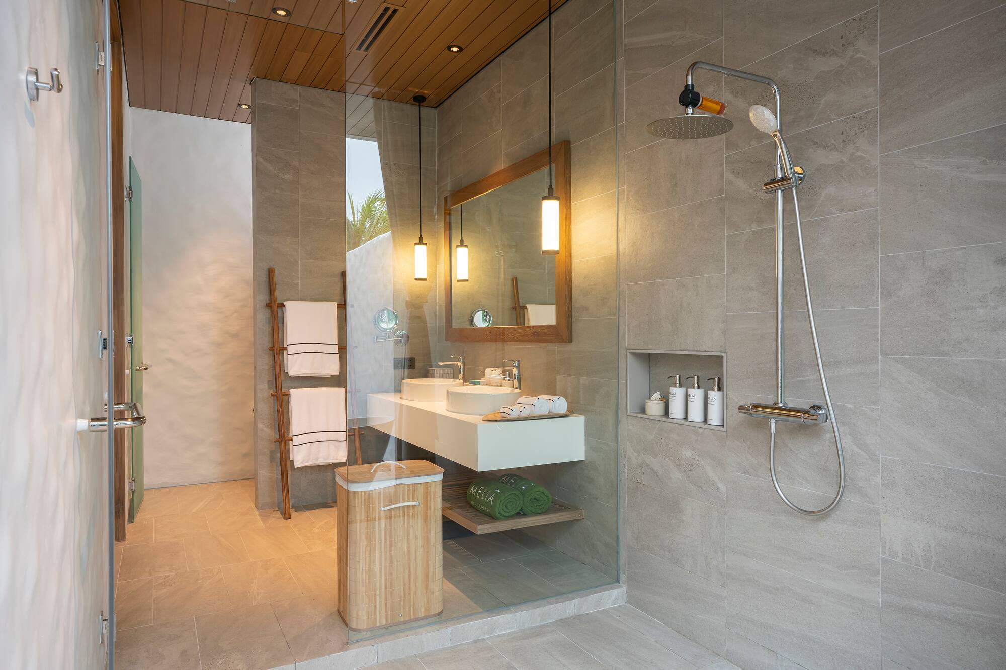 a bathroom with a shower and sink
