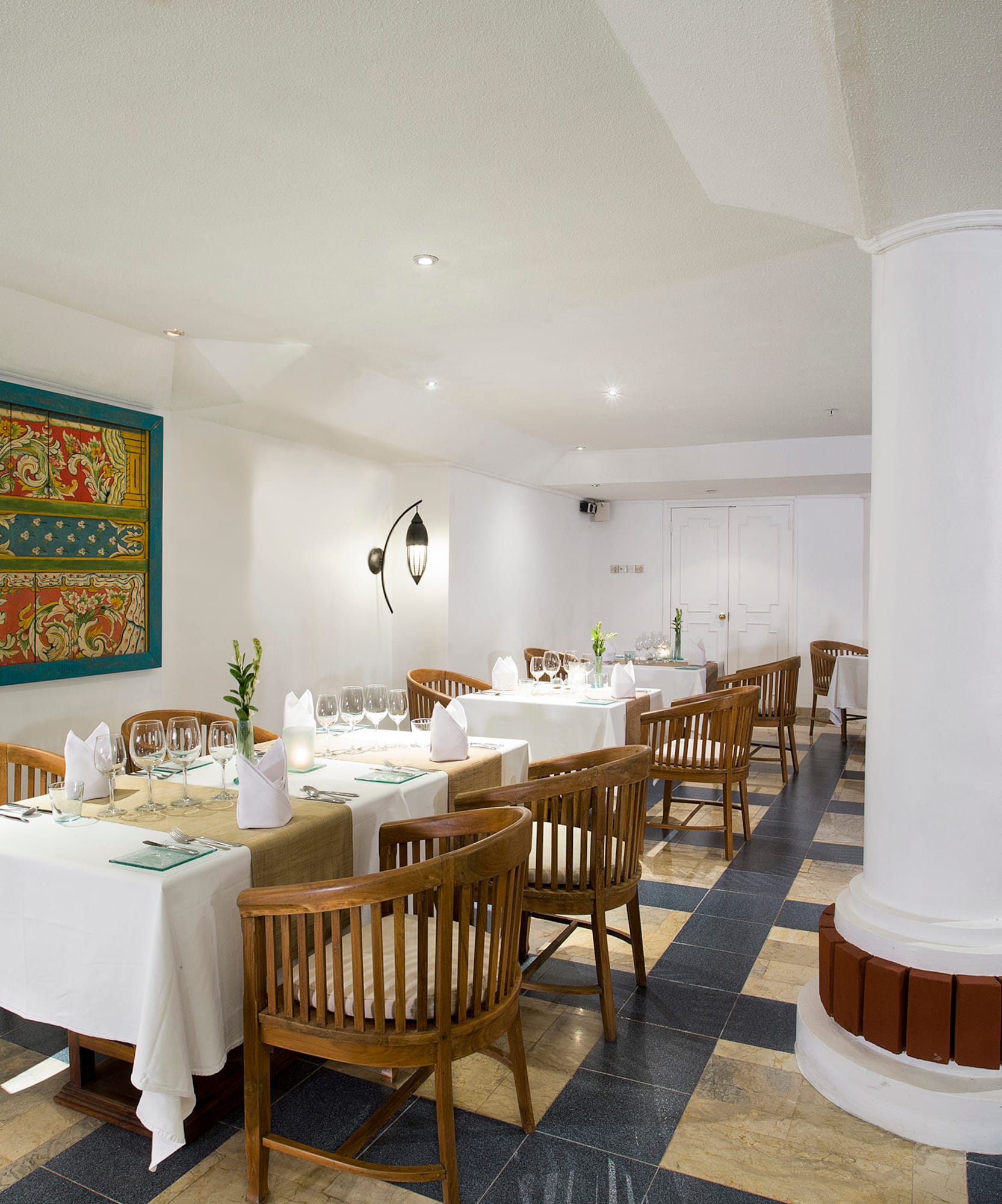 a room with tables and chairs