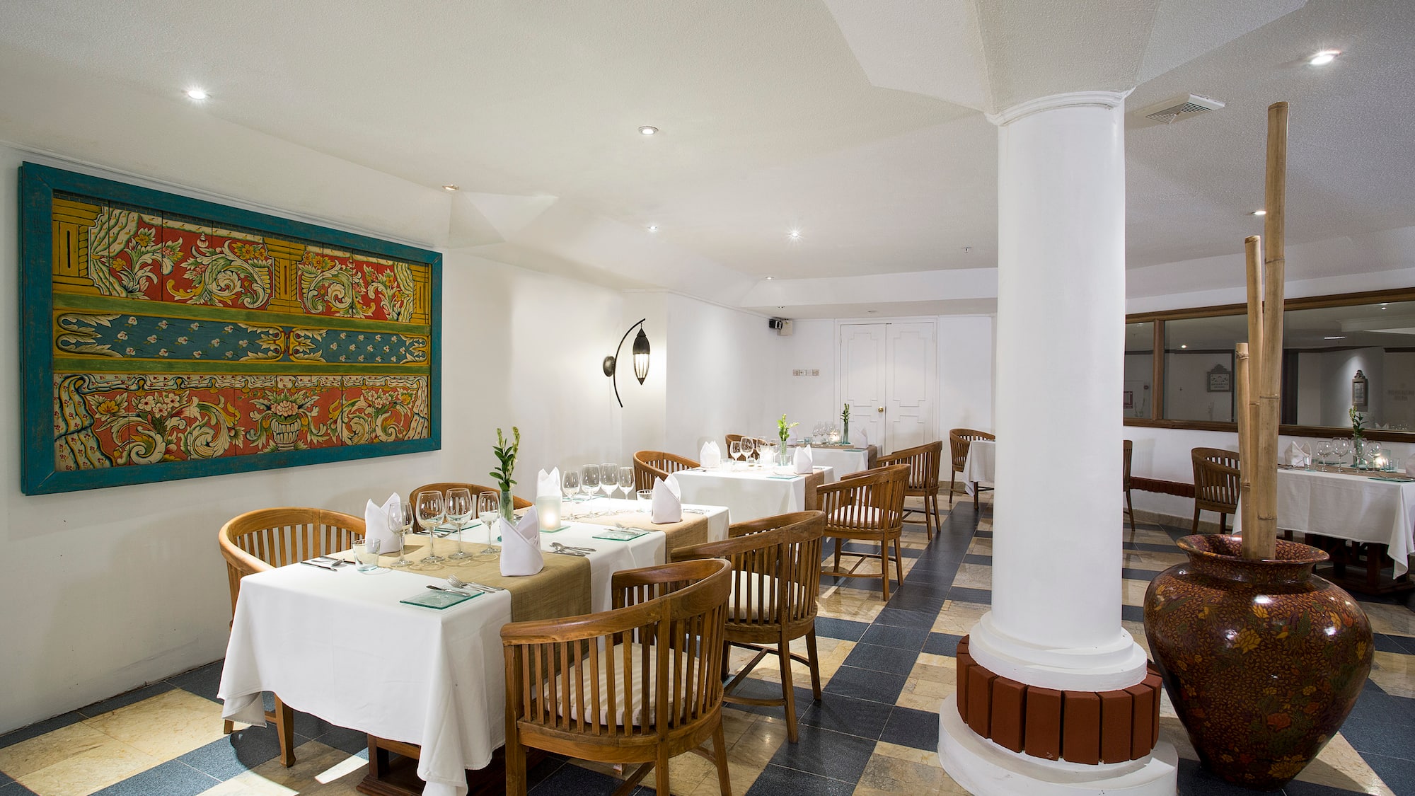 a room with tables and chairs