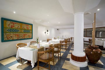 a room with tables and chairs